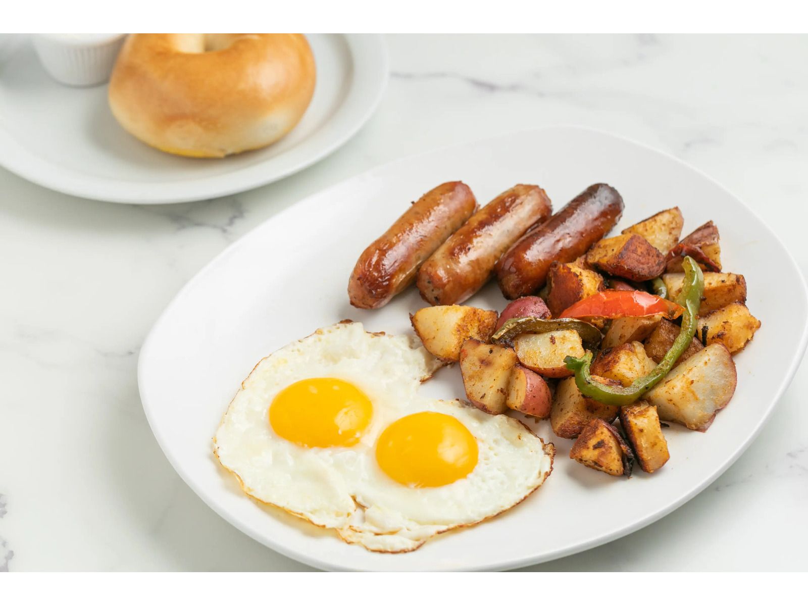 Any Style 2 Eggs Bacon or Sausage.