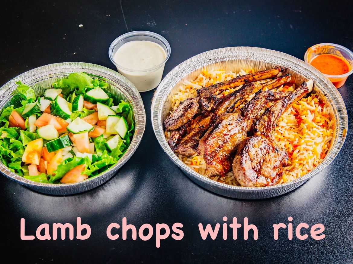 Lamb chops over rice.