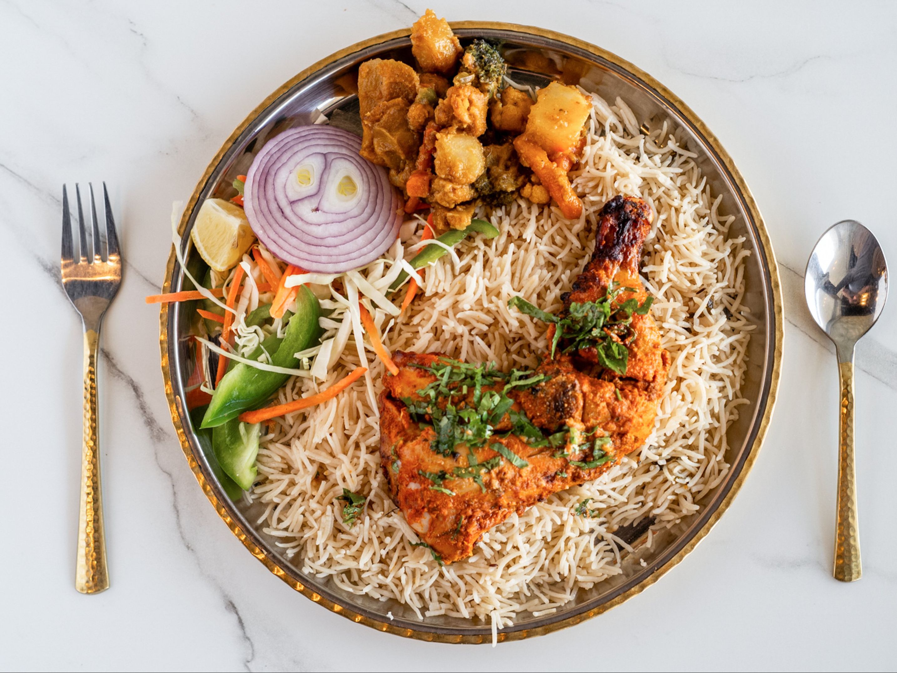 Chicken Leg + Pulav Rice + Sauteed Veggies.