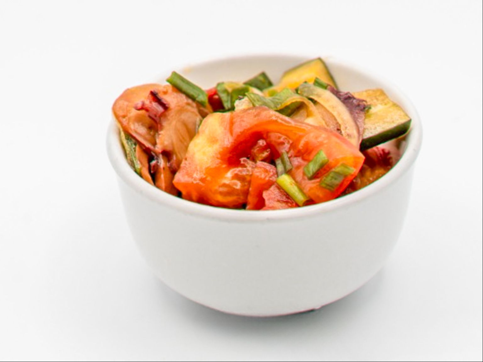 Maui Style Tako Poke from Yama's Fish Market — Thinly cut tako, sliced round onions, green onions with Yama's special sauce, a Maui special. Click for available sizes/pricing