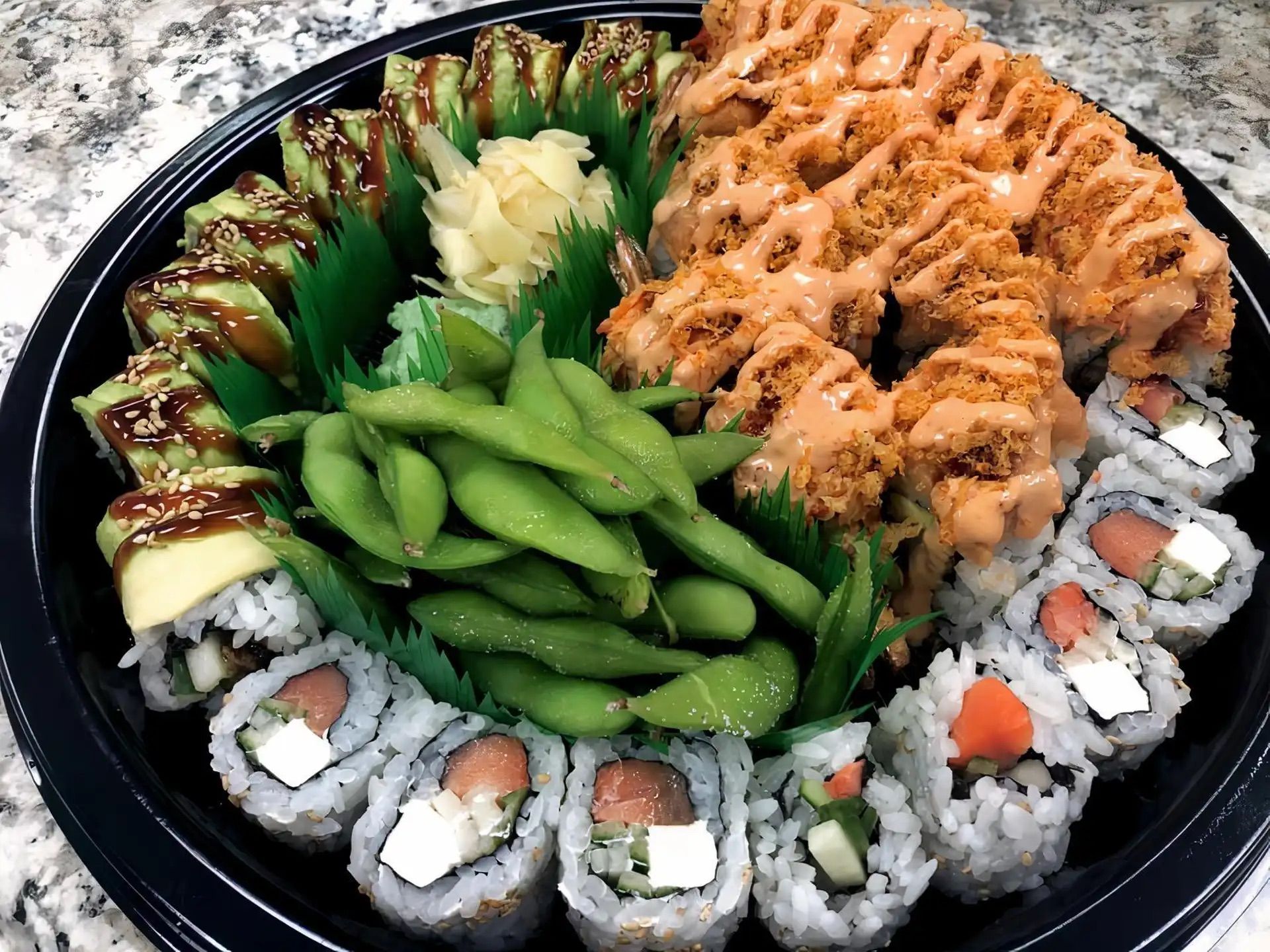 P2 (1 Caterpillar Roll, 1 Philadelphia Roll, 2 Spicy Crab Crunch Roll, Edamame).