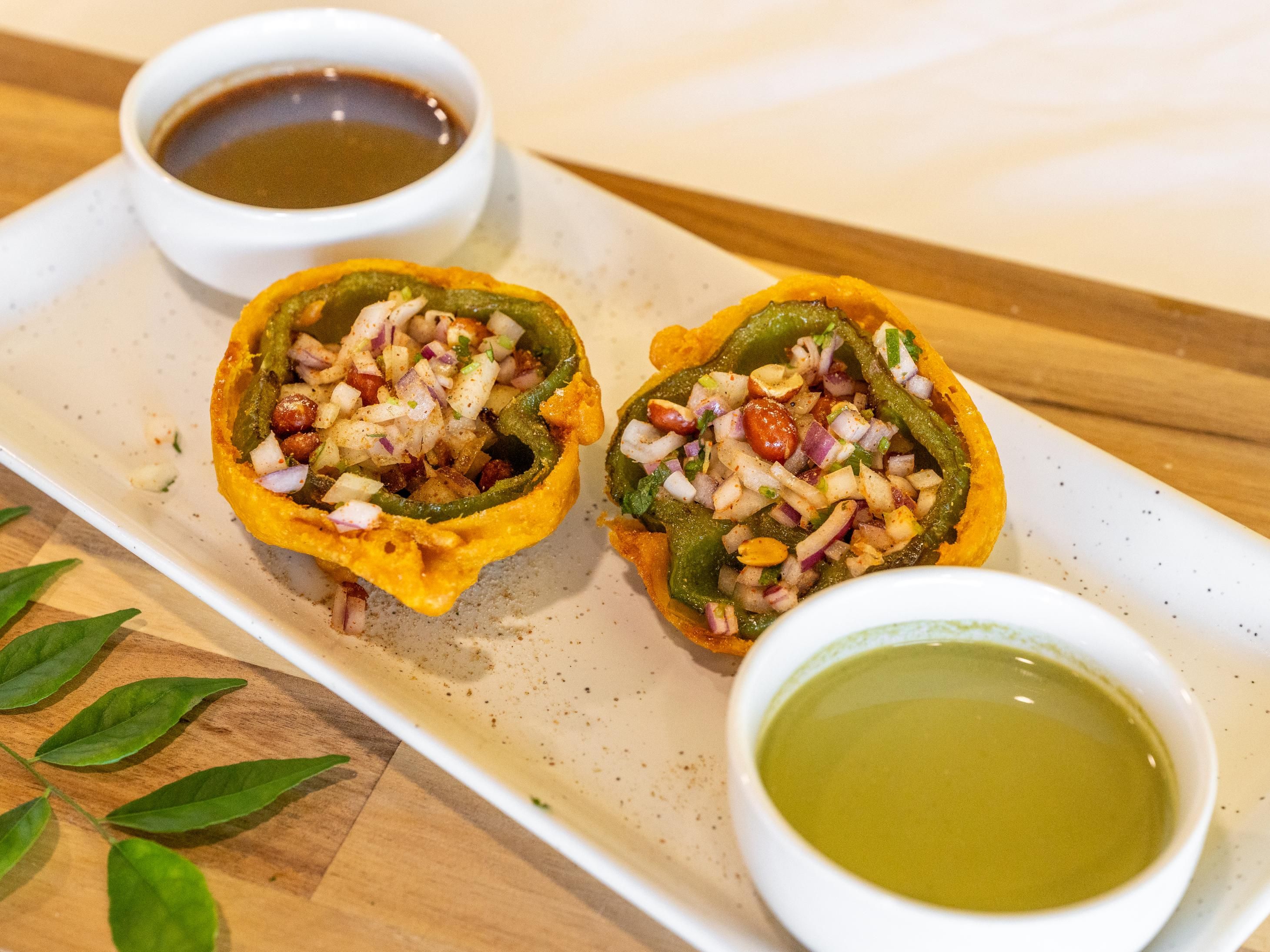 Onion Stuffed Bell Pepper Bonda (2 Pieces).