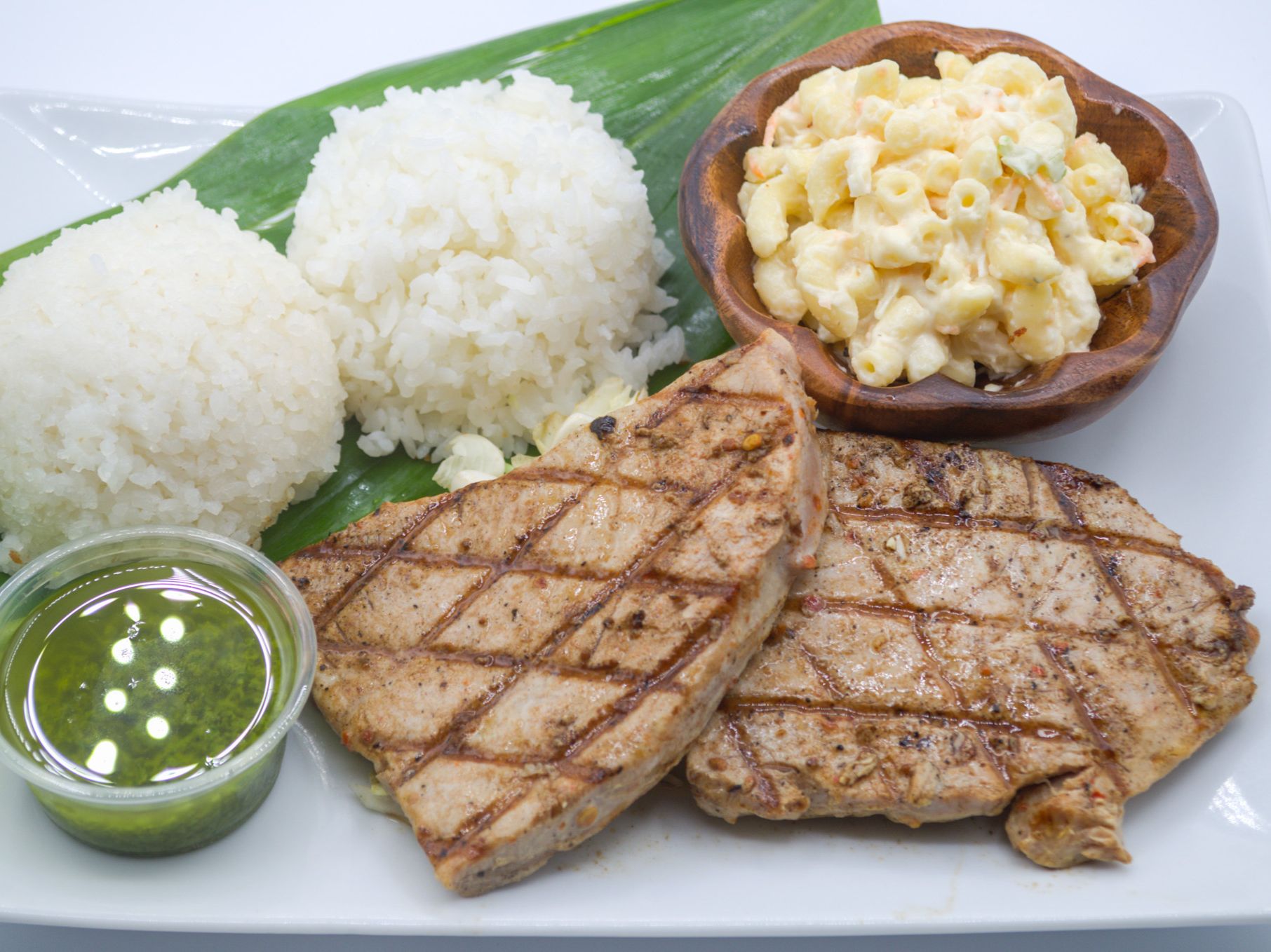 #18 Grilled Ahi from Yama's Fish Market — Fresh auction-sourced ahi fillet, simply seasoned and grilled to perfection, then topped with our in-house green onion and oil sauce. Served with white rice and mac salad.