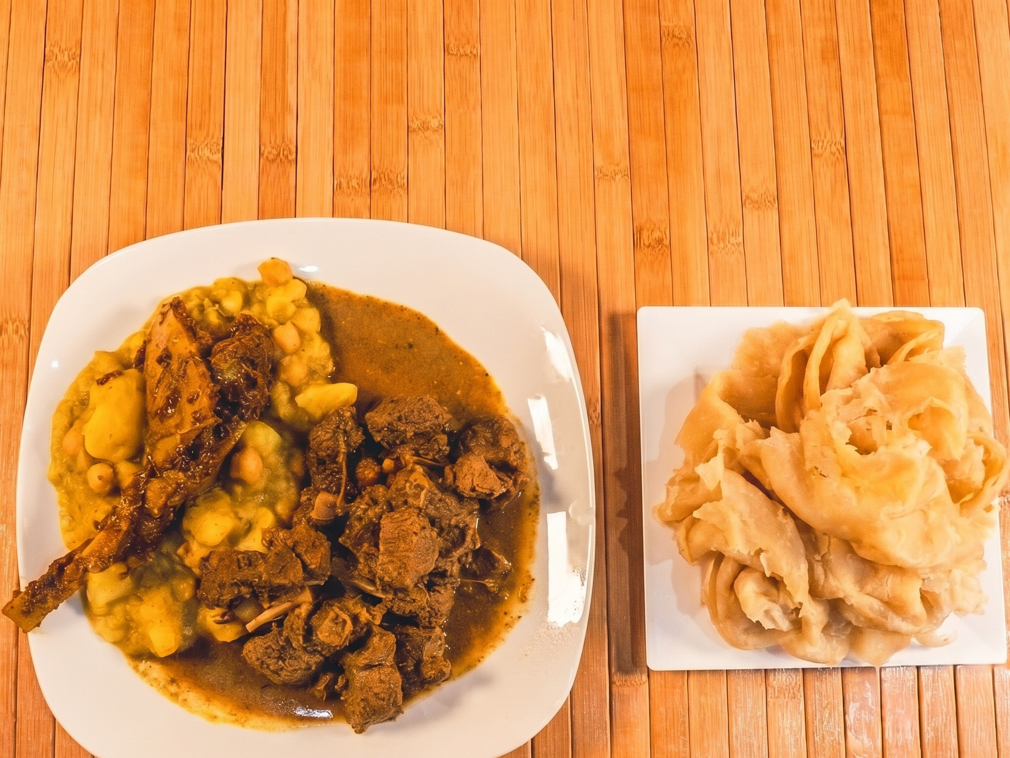 Curry Goat - Buss Up Shut.