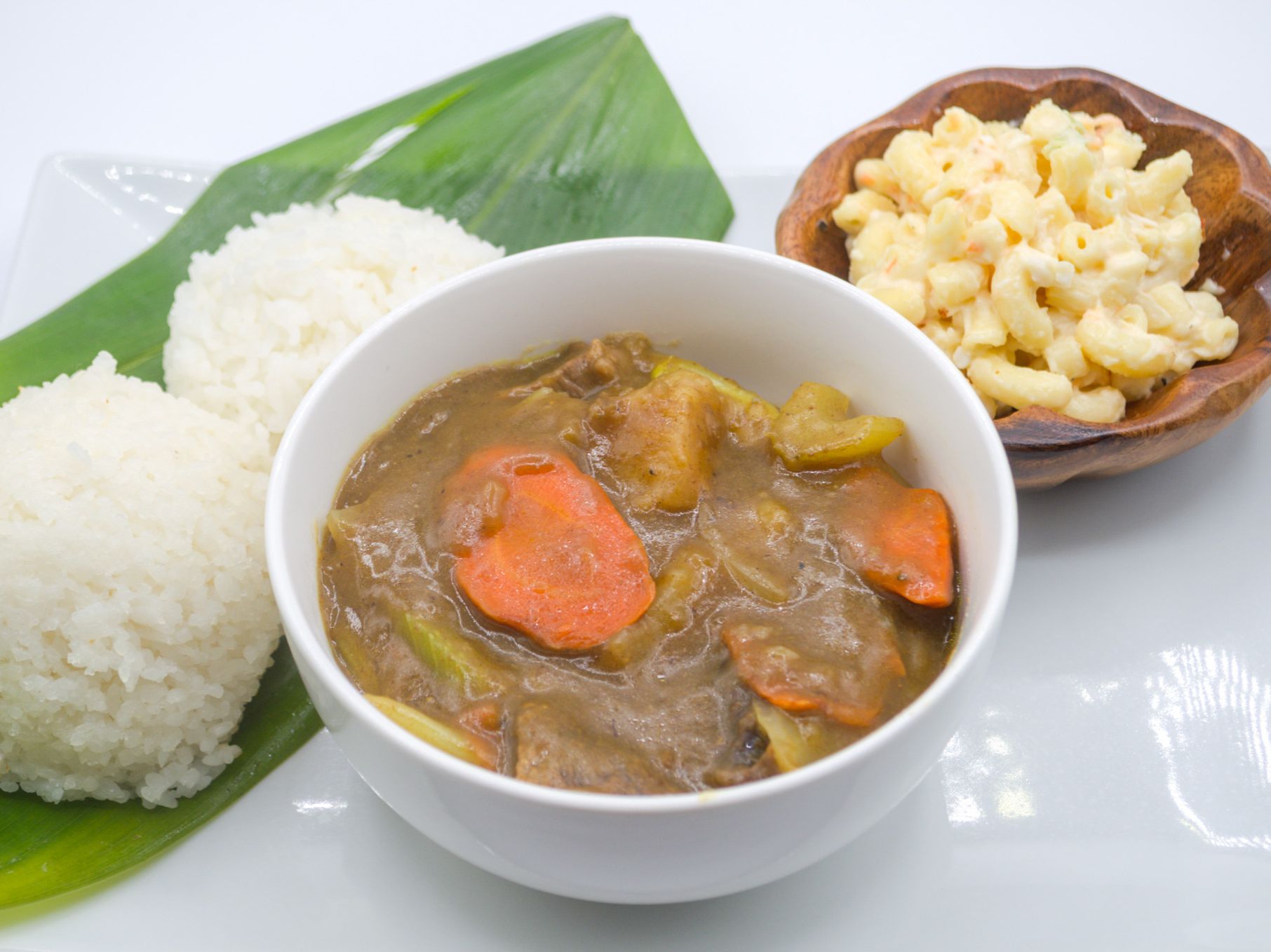 #23 Curry Stew from Yama's Fish Market — Chunks of beef simmered with carrots, potatoes, and onions in a rich curry sauce — warm and hearty. Served with white rice and mac salad.