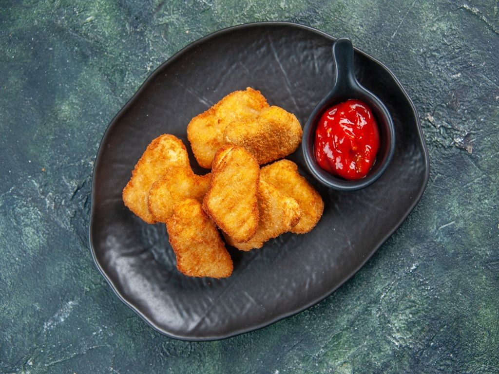 CHICKEN NUGGETS.