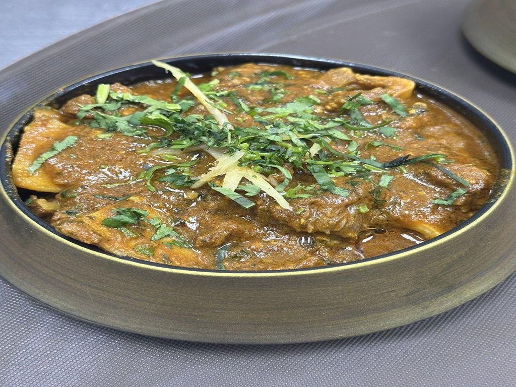 DELIGHTFUL GOAT CURRY.