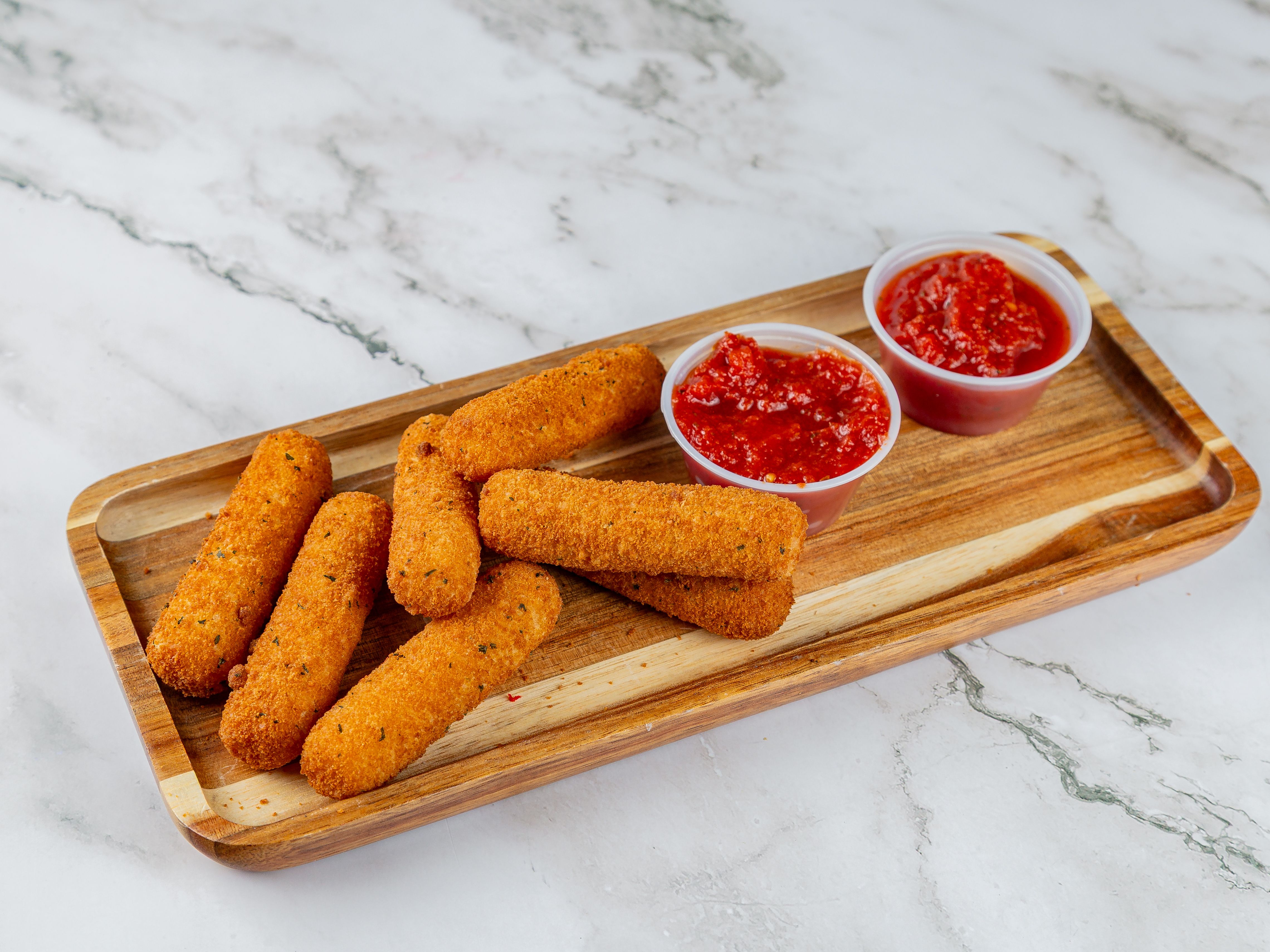 Mozzarella Sticks (6 PC.).