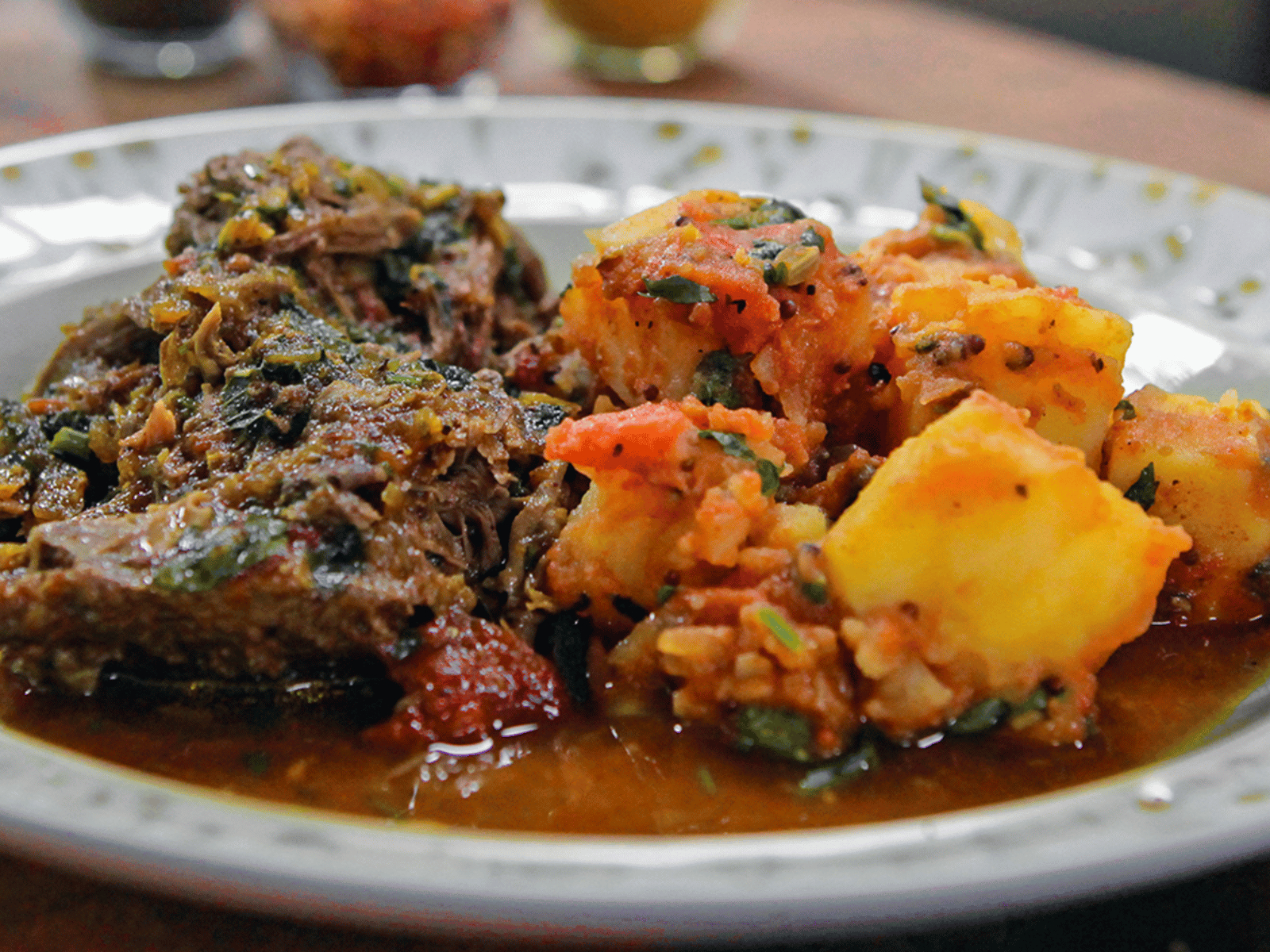 Lamb Shoulder with Bombay Potatoes.