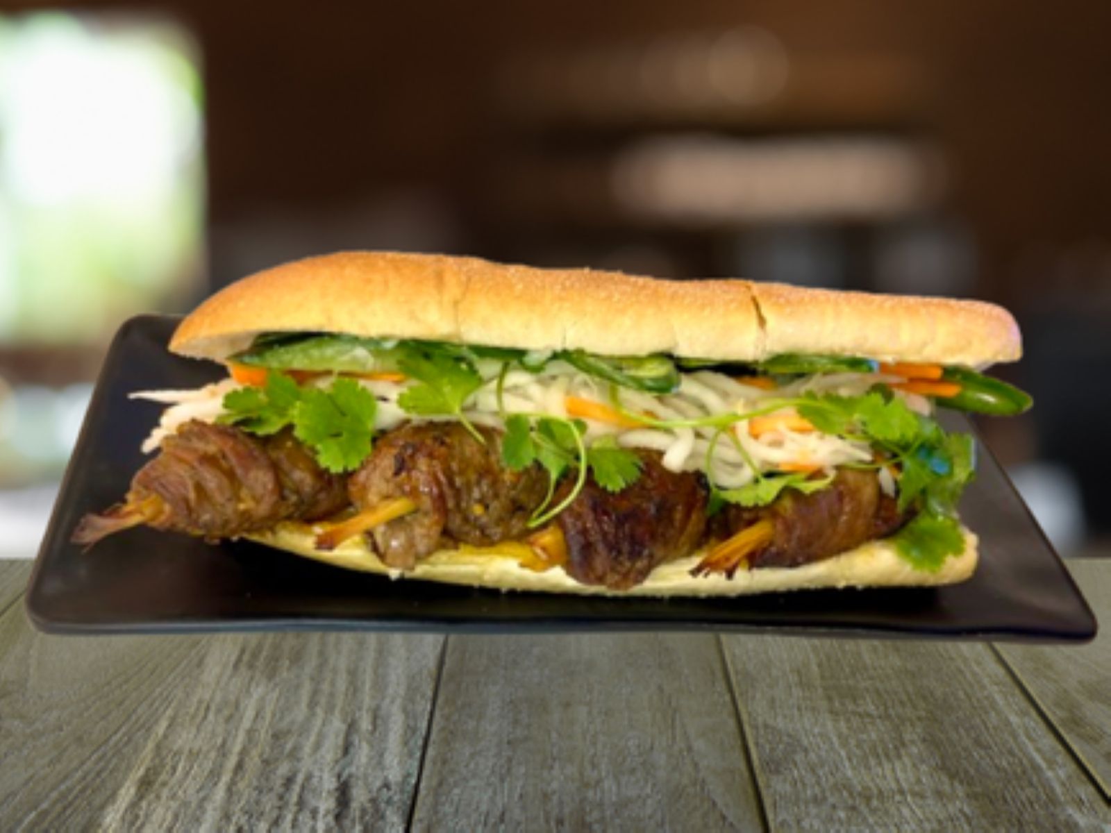 Banh Mi Pork Satays - Bánh Mì Thịt Heo Cuốn Sả Nướng.
