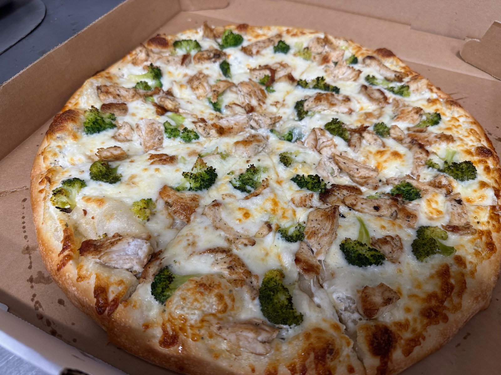 Roasted Garlic Chicken & Broccoli Pizza.
