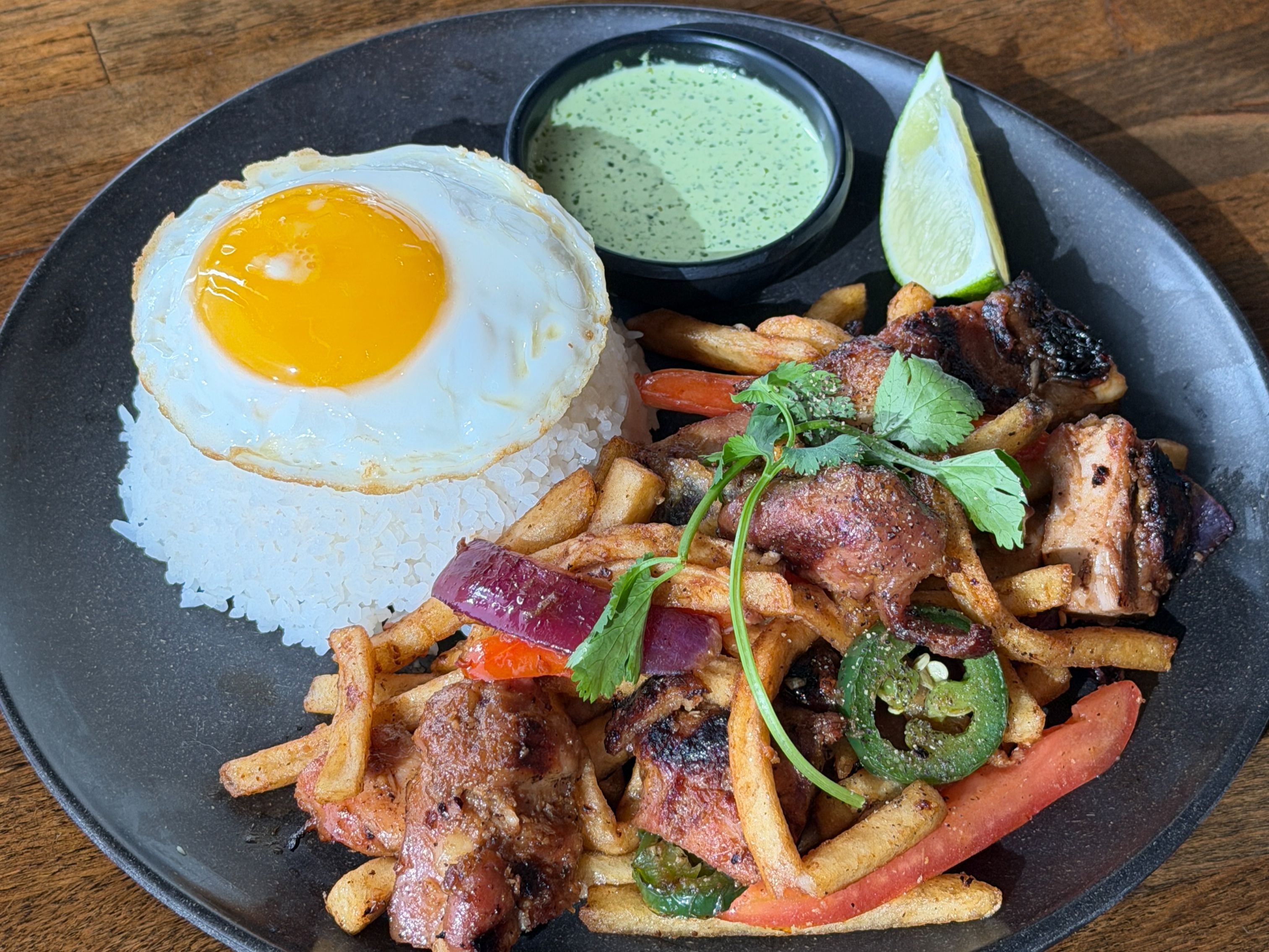 Lomo Saltado w/ Grilled Chicken.