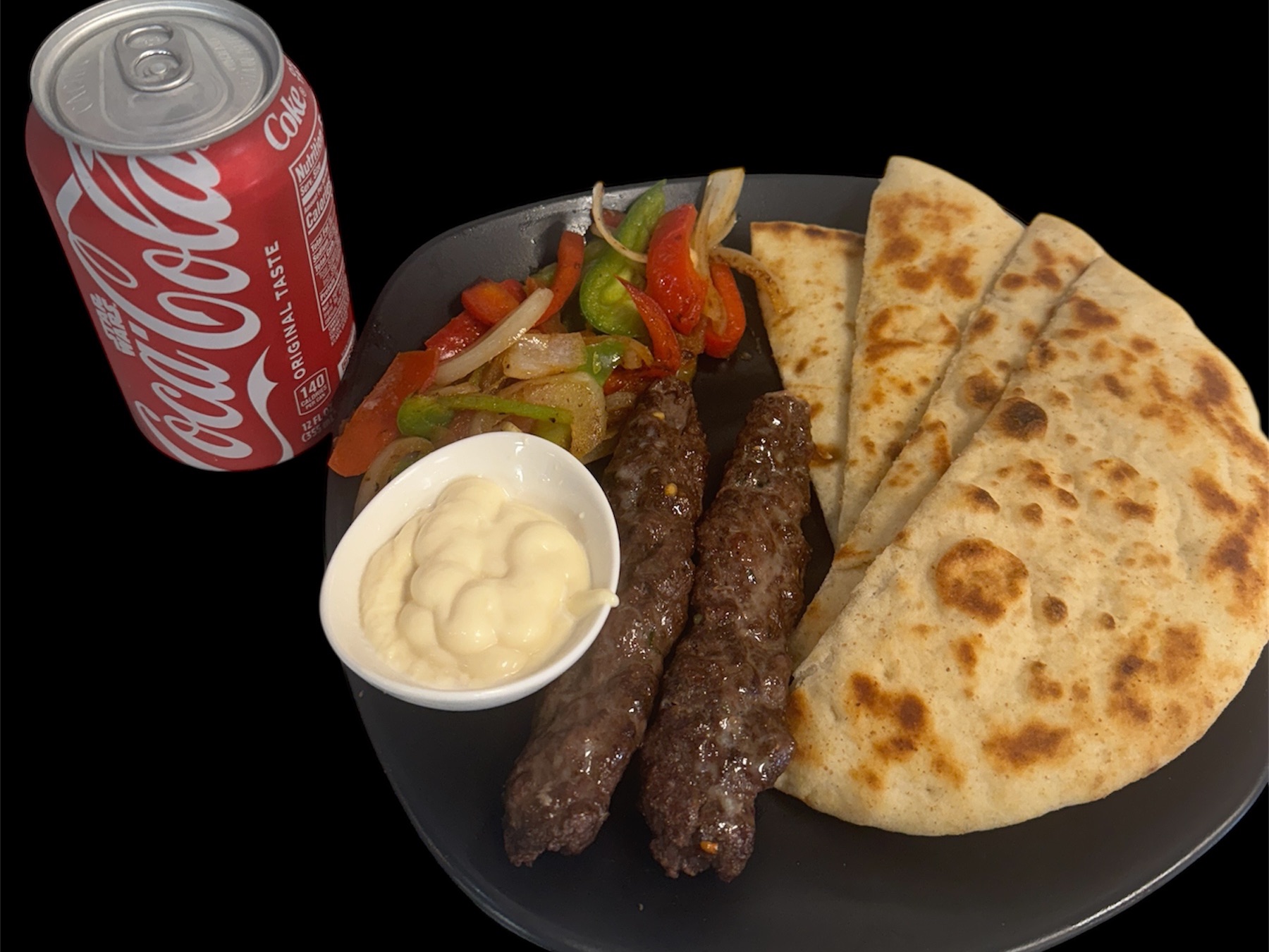 Lamb Kabab Lunch Combo( 2pieces Of Seekh Kabab With Flavoured Basmati Rice, Pita Bread, Sauted Vegi, Garlic Dip,12oz Soda Can).