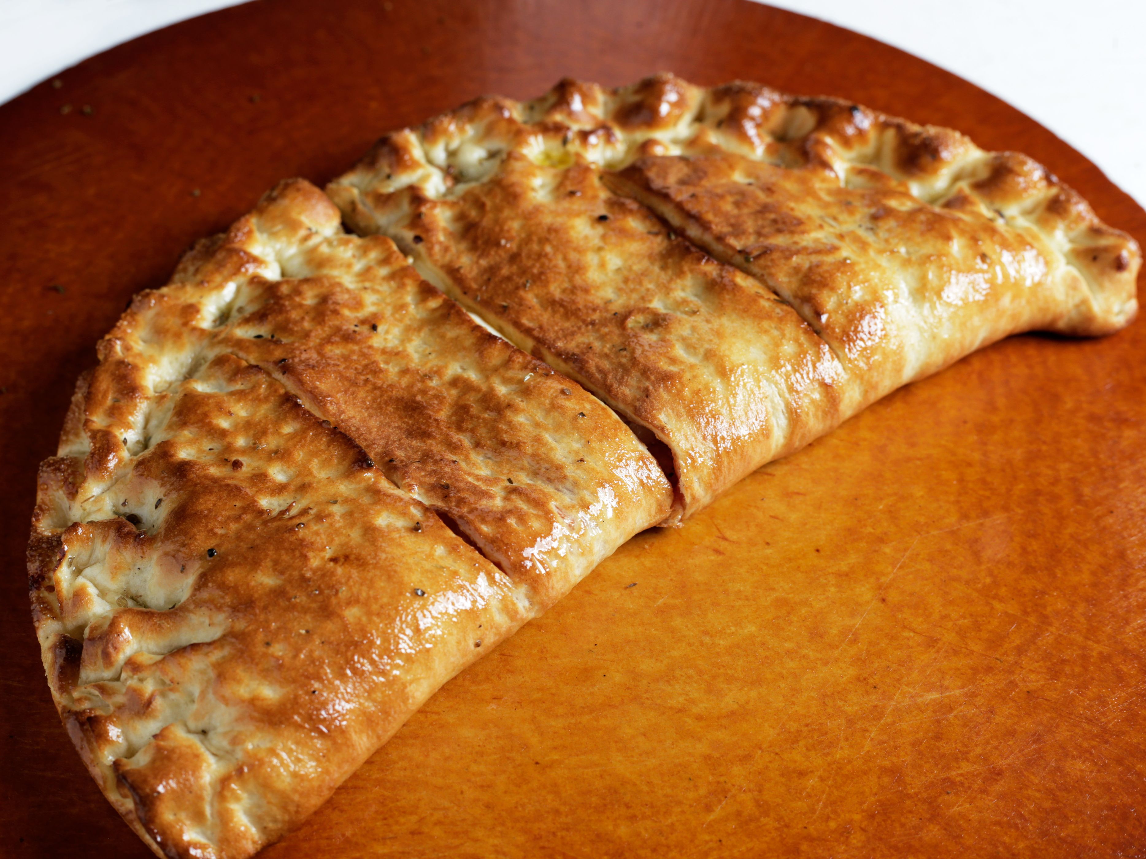 Halal Tandori Chicken Calzone.