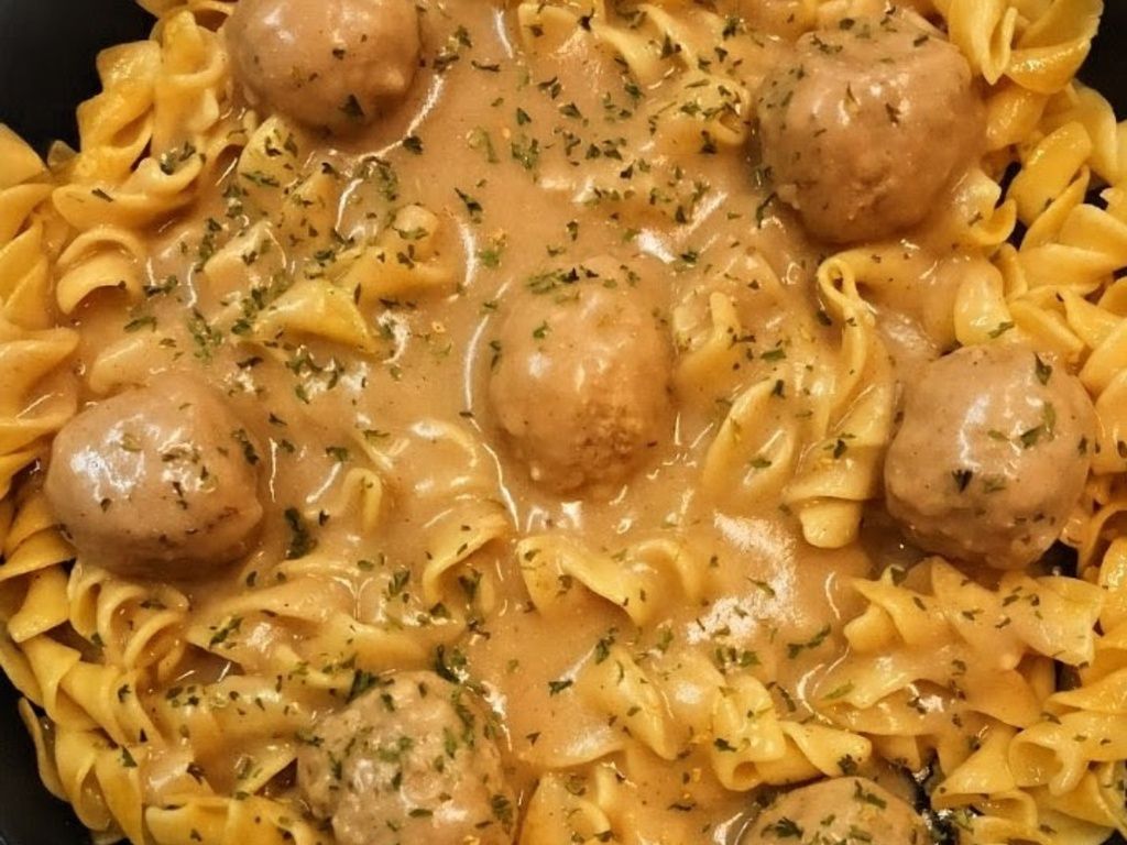 Swedish Meatballs Over Egg Noodles.