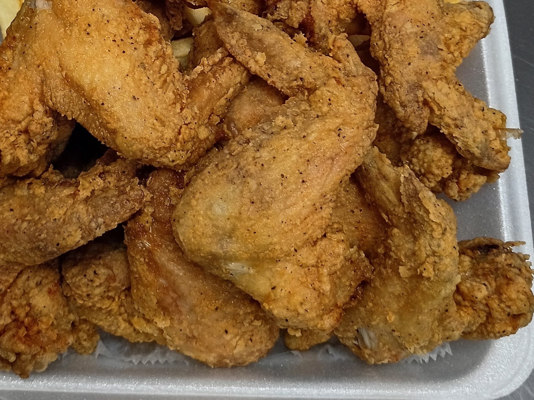 100 Whole Wings + Family Fries