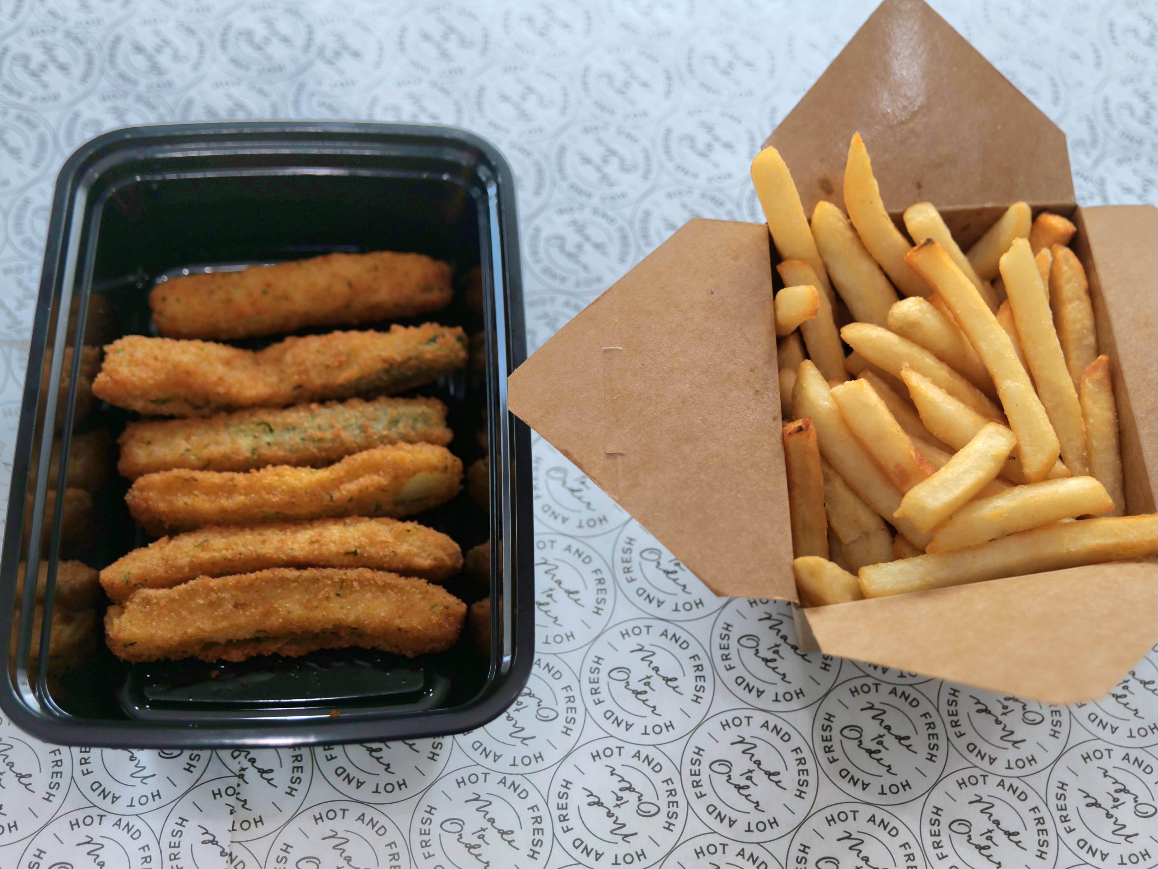 Zucchini Sticks (6 Pcs.) with French Fries.
