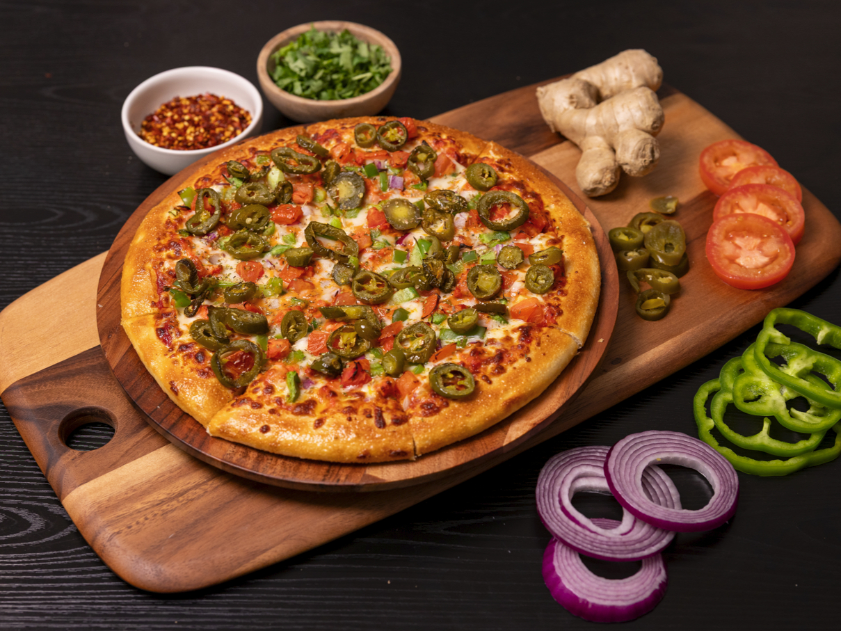 Butter Paneer Masala Pizza.