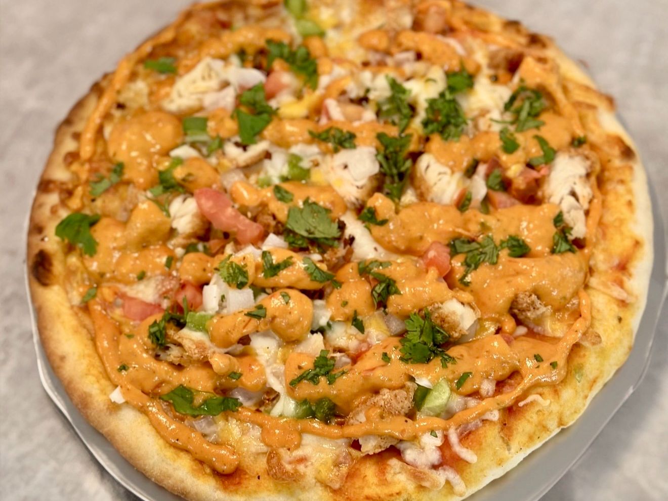 Butter Chicken Pizza.
