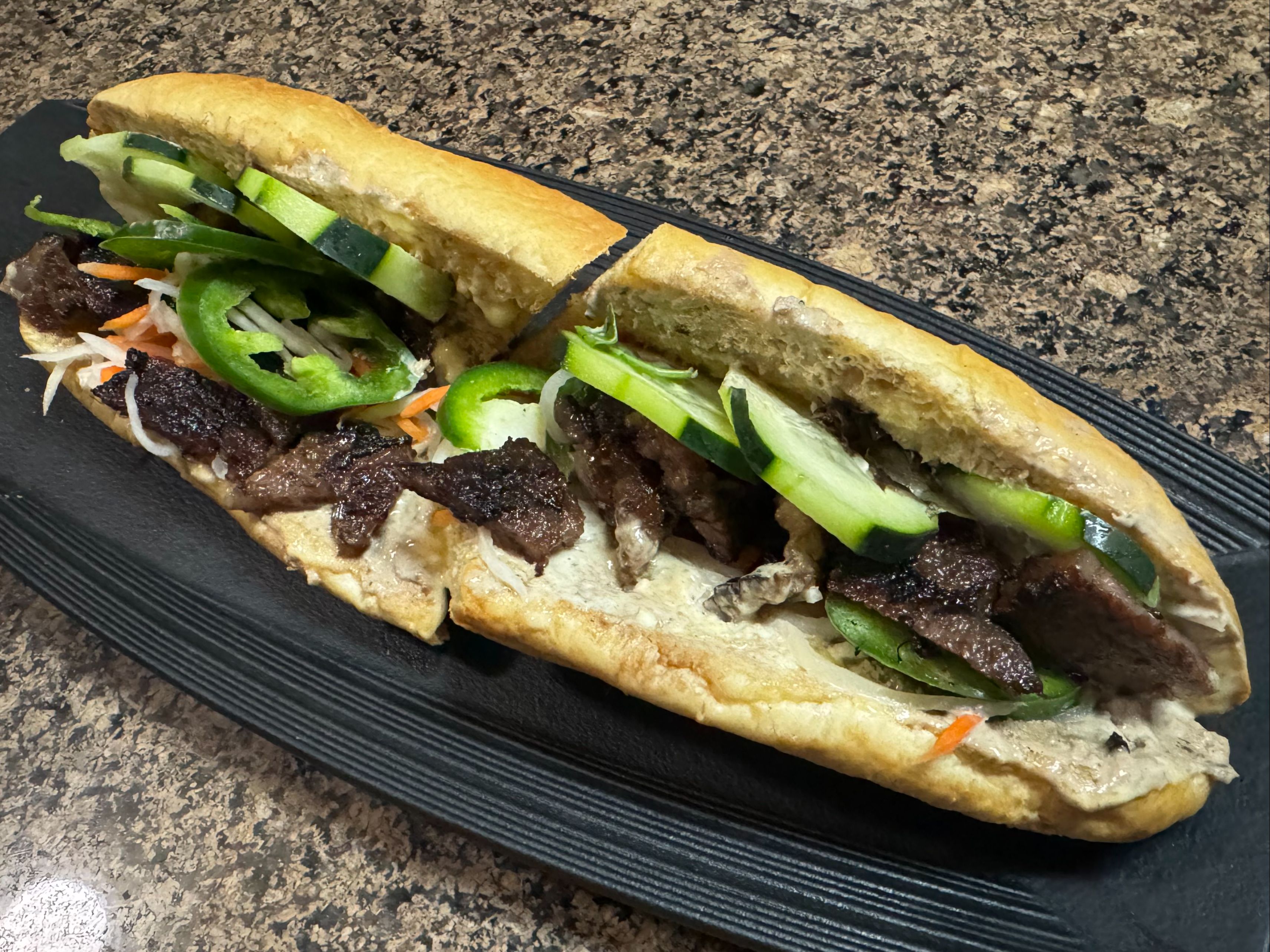 KOSMIK FIRE GRILLED SHORT RIB BANH MI.