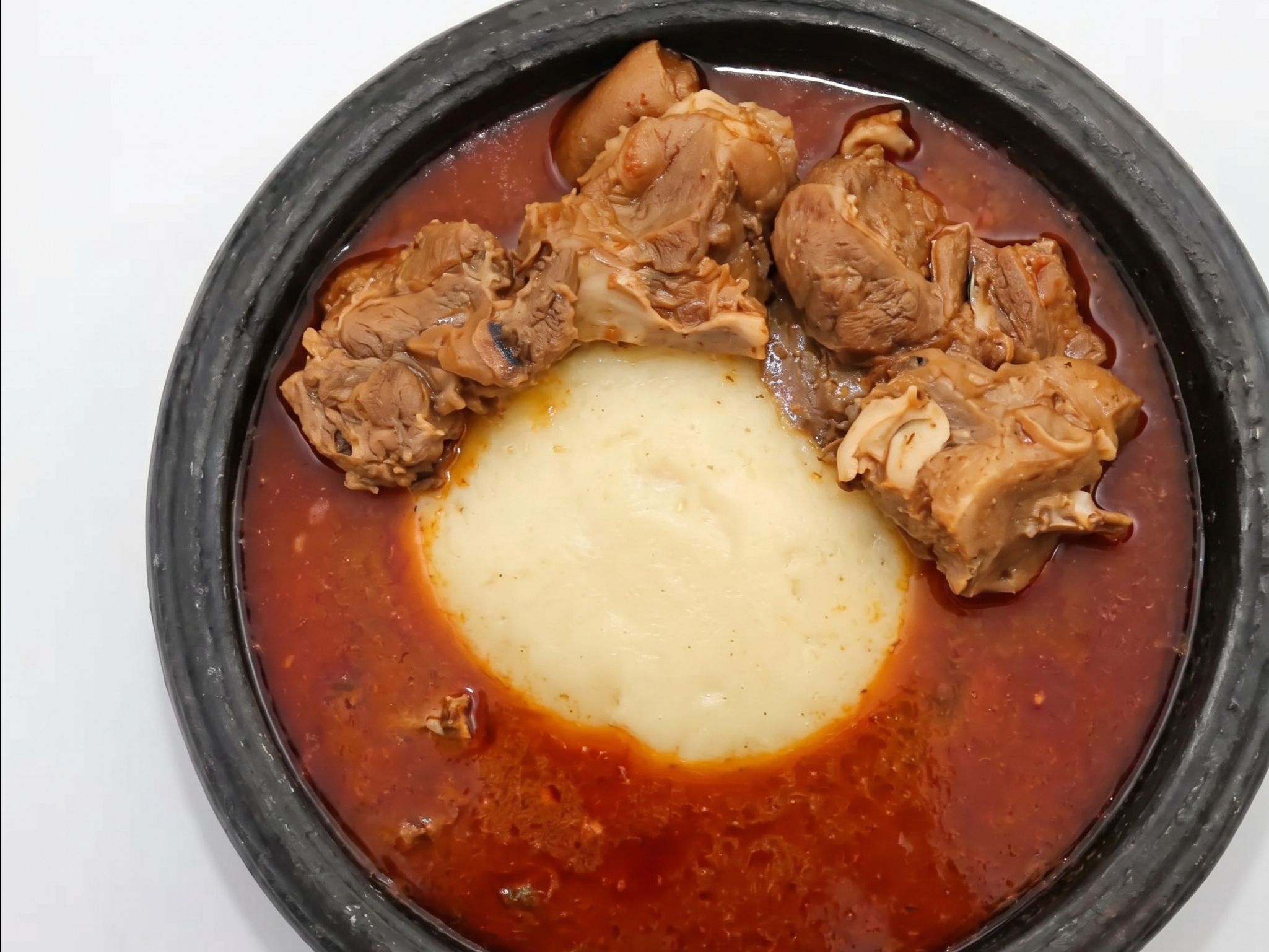Light Pepper Soup & Swallow Small.