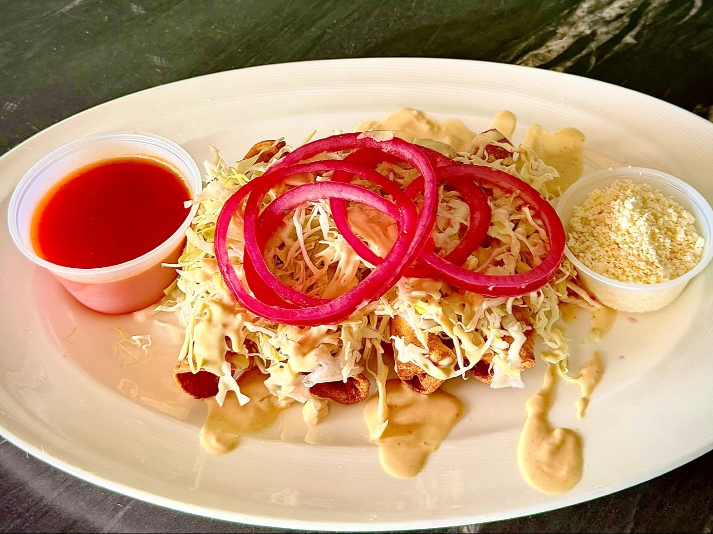Tacos Catrachos (L).