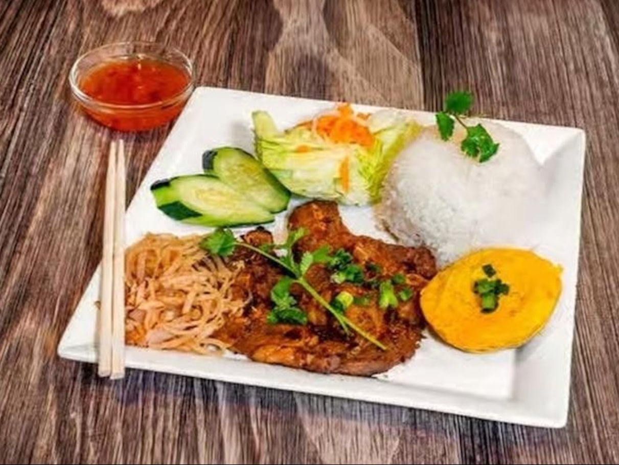 C68. Rice w/ Grilled Pork Chop, Shredded Pork, Egg Cake.