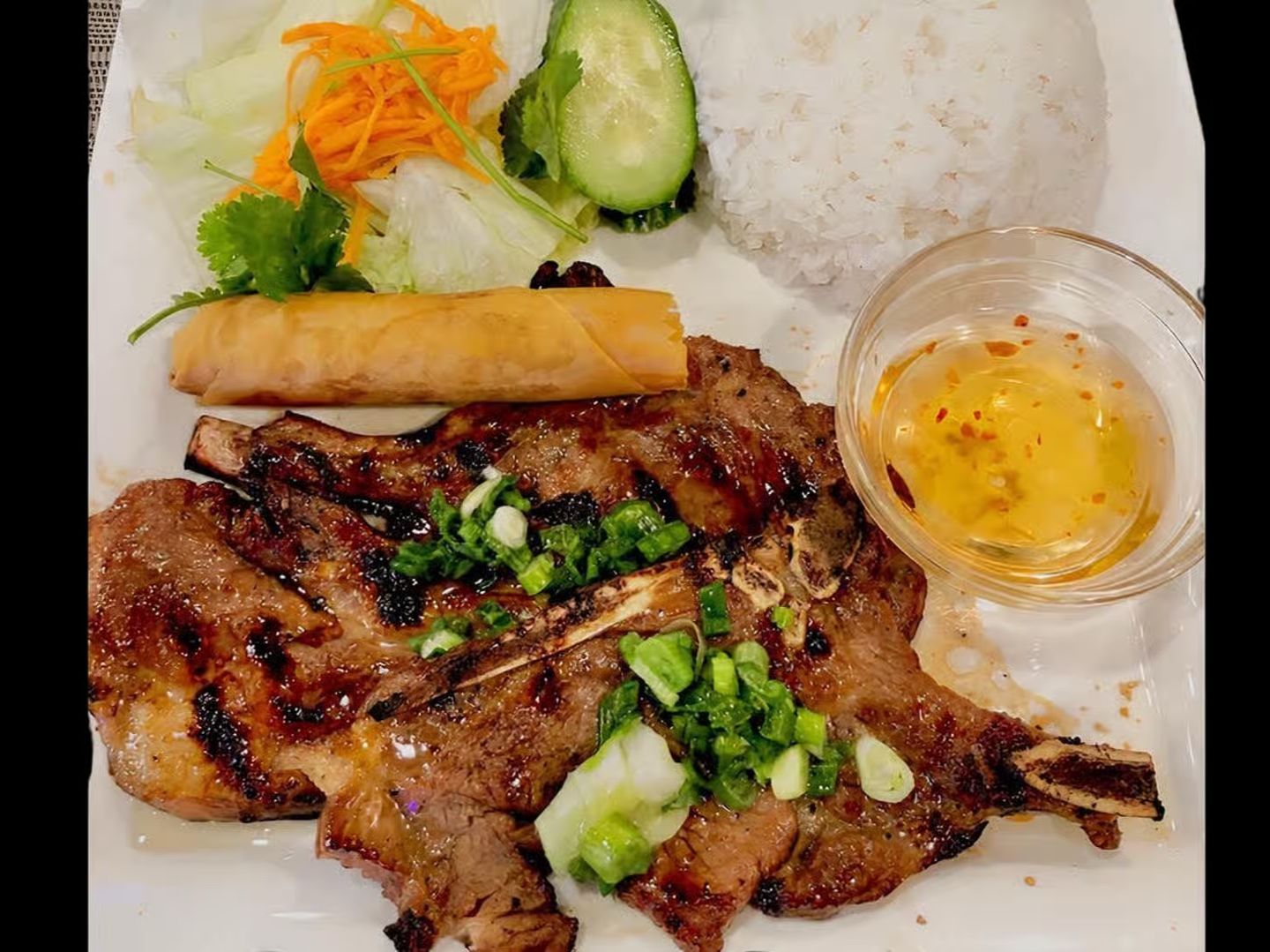 C65. Rice w/ Grilled Porkchop, Egg Roll