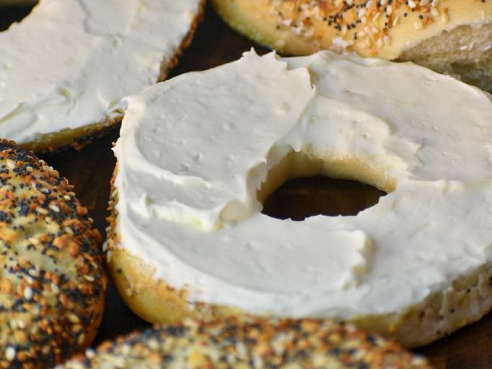 BAGEL W/ CREAM CHEESE & BUTTER (both sides).