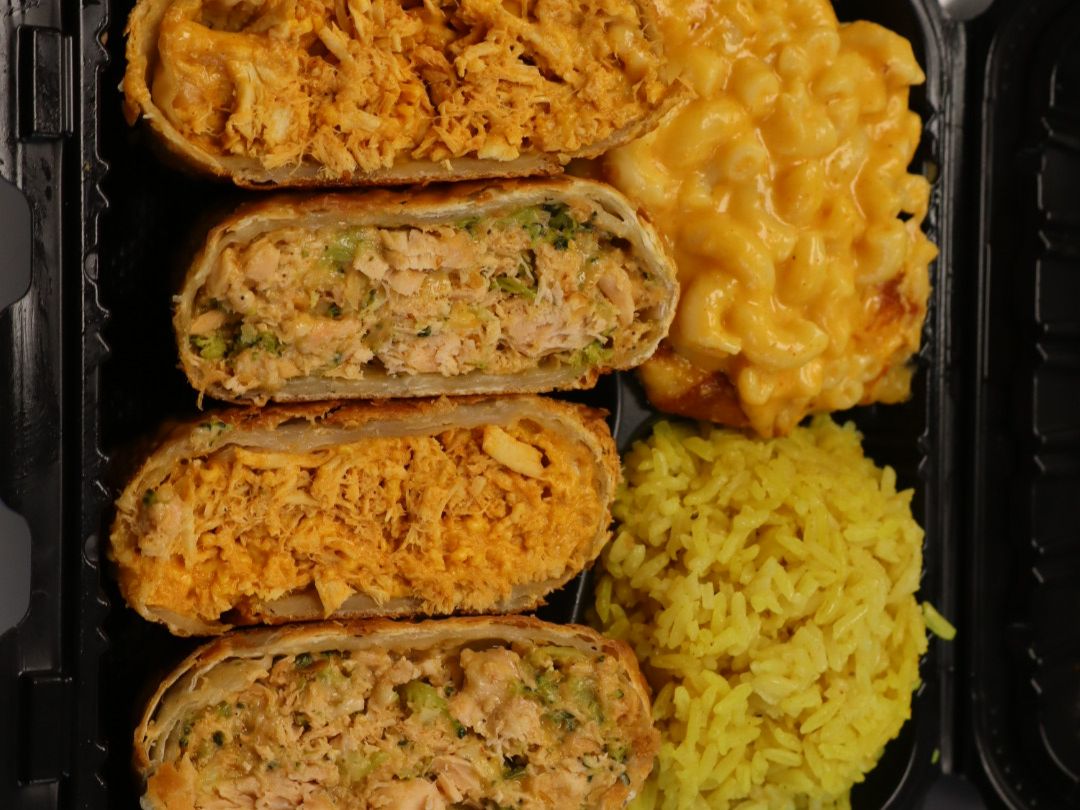 Half Buffalo chicken & Half Salmon eggrolls with two sides