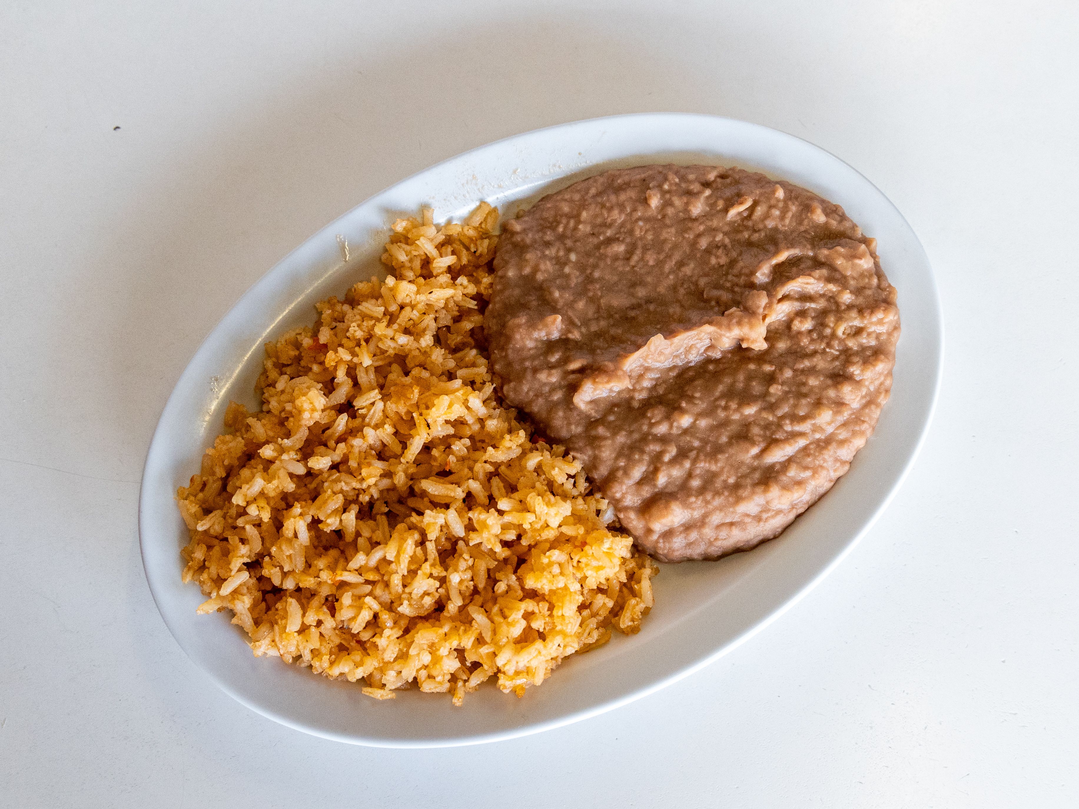 Plato De Arroz y Frijoles.