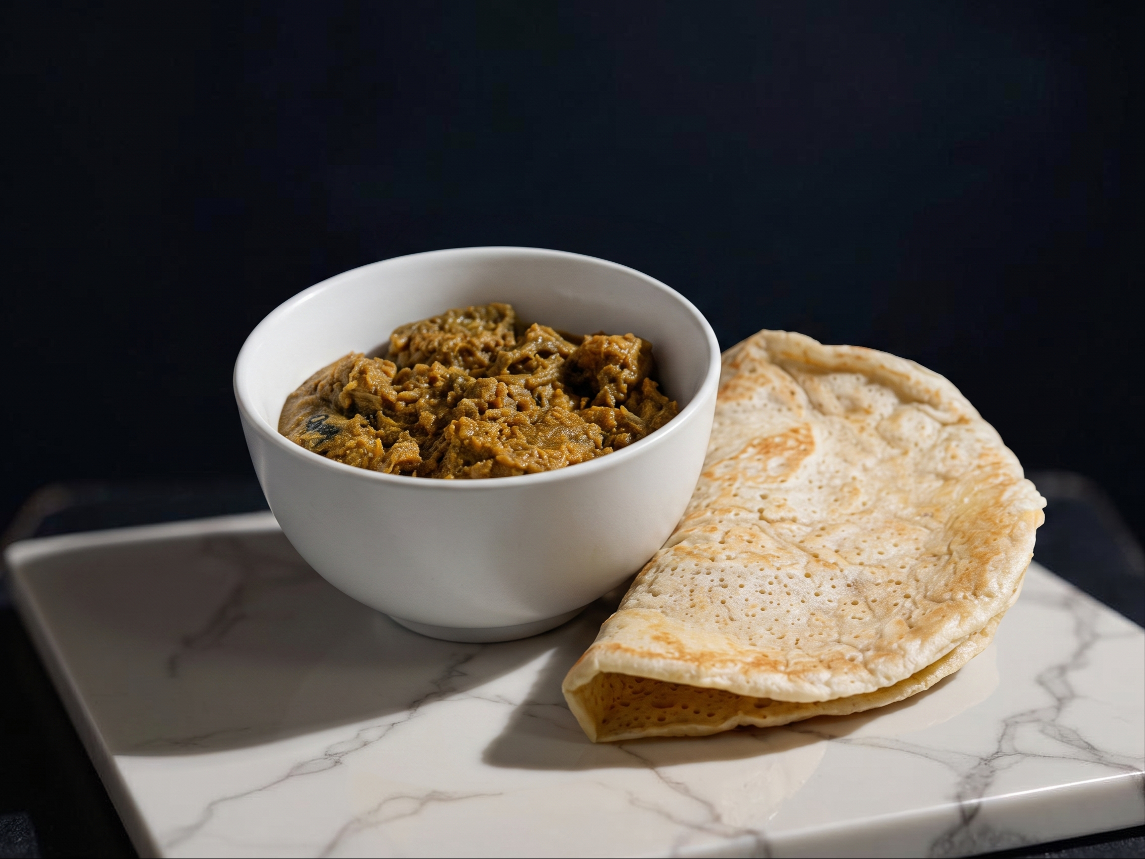 Kal Dosa (2Pcs) with Mutton Curry.