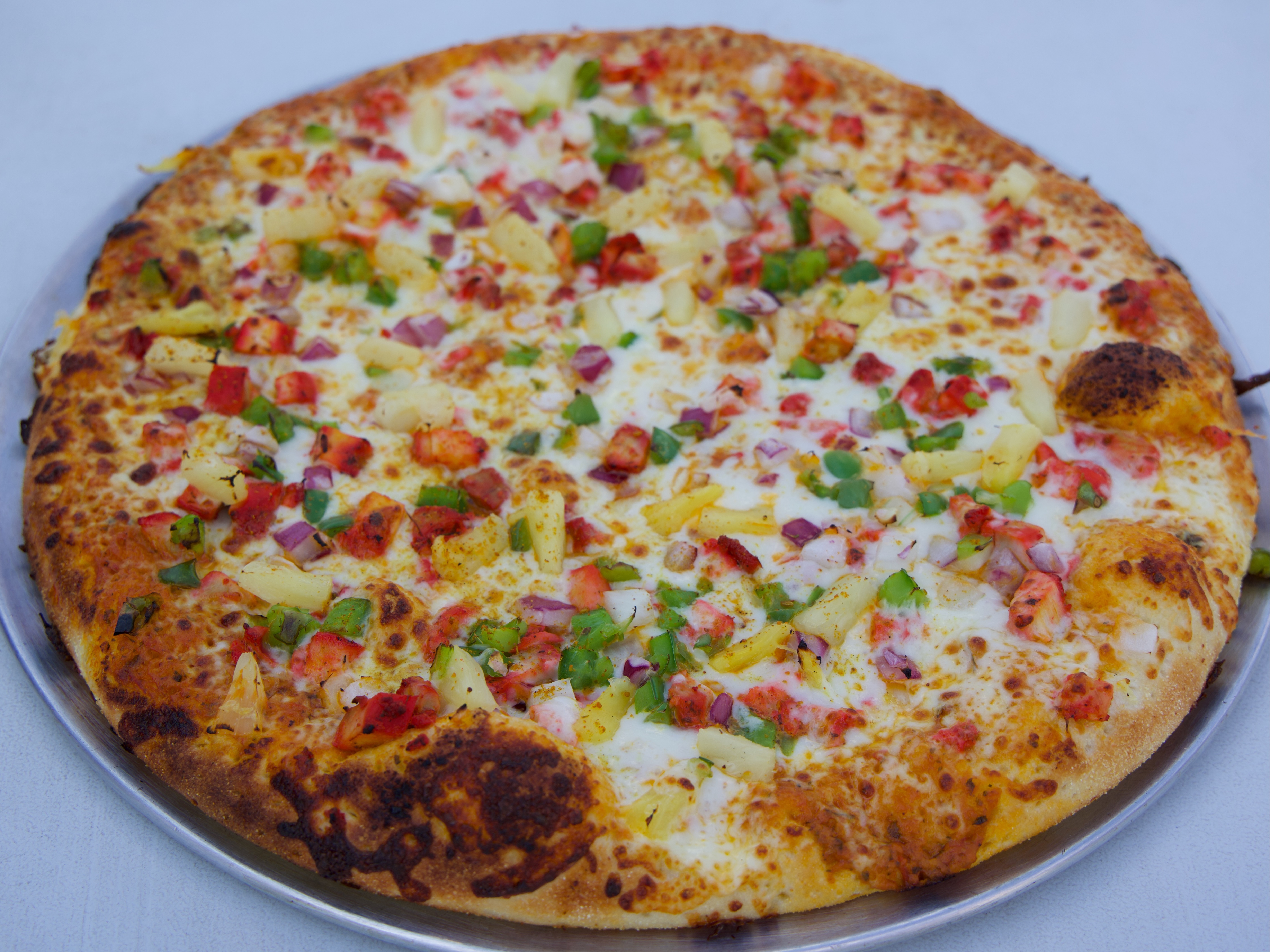 Achari Chicken Pizza.