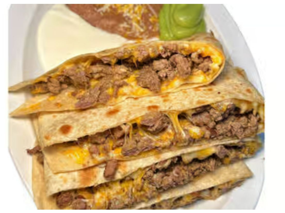 Al Pastor Super Quesadilla.