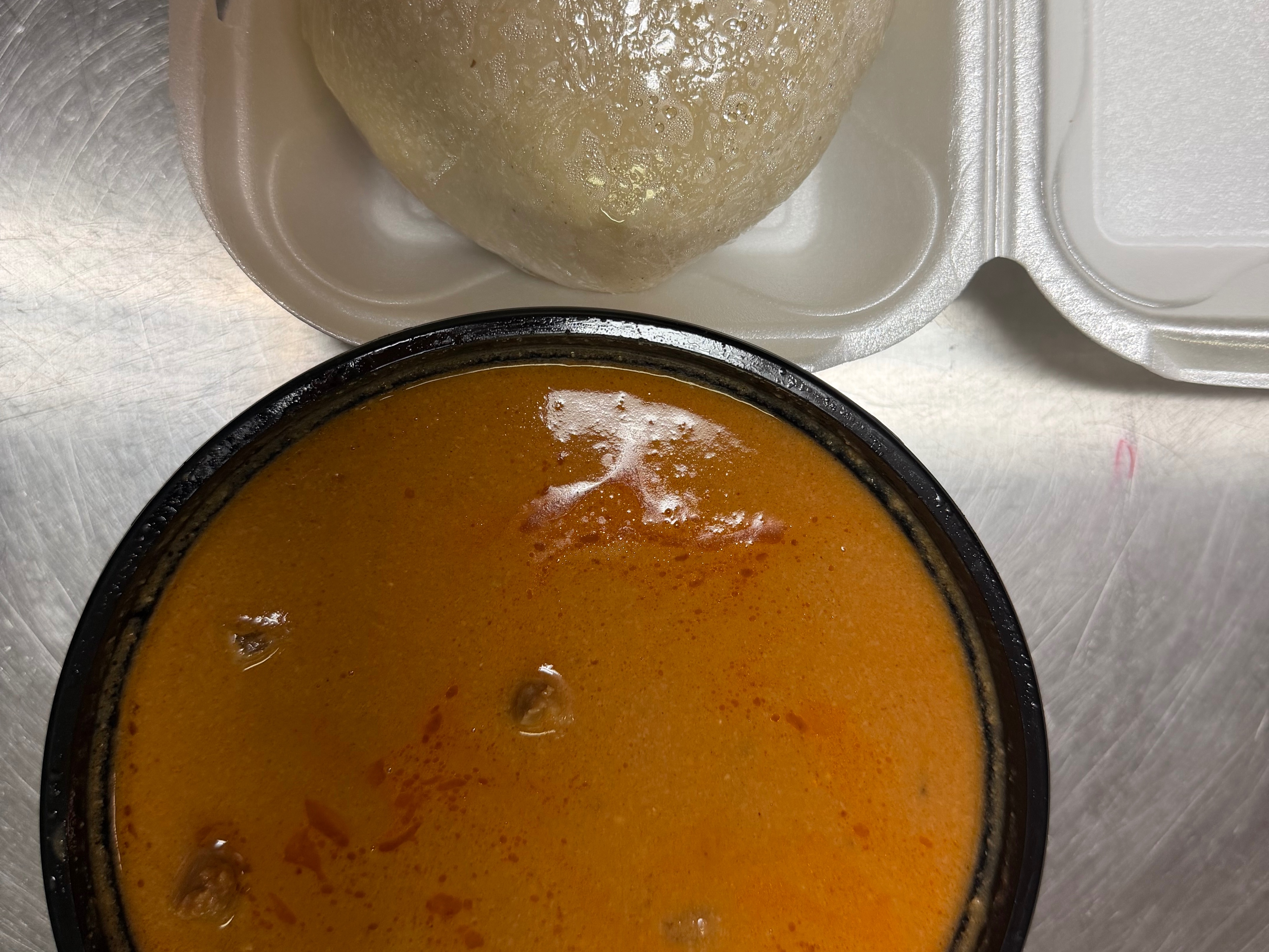 Peanut Goat Soup With Banku.