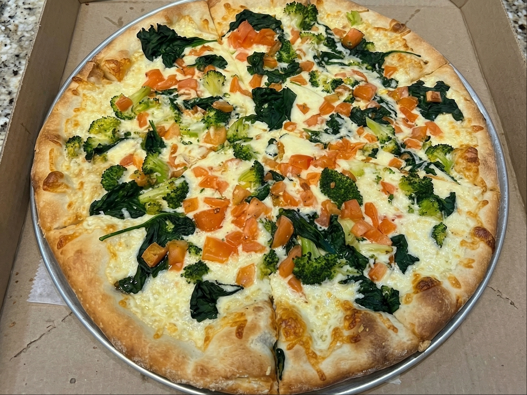 Spinach Specialty Pizza.