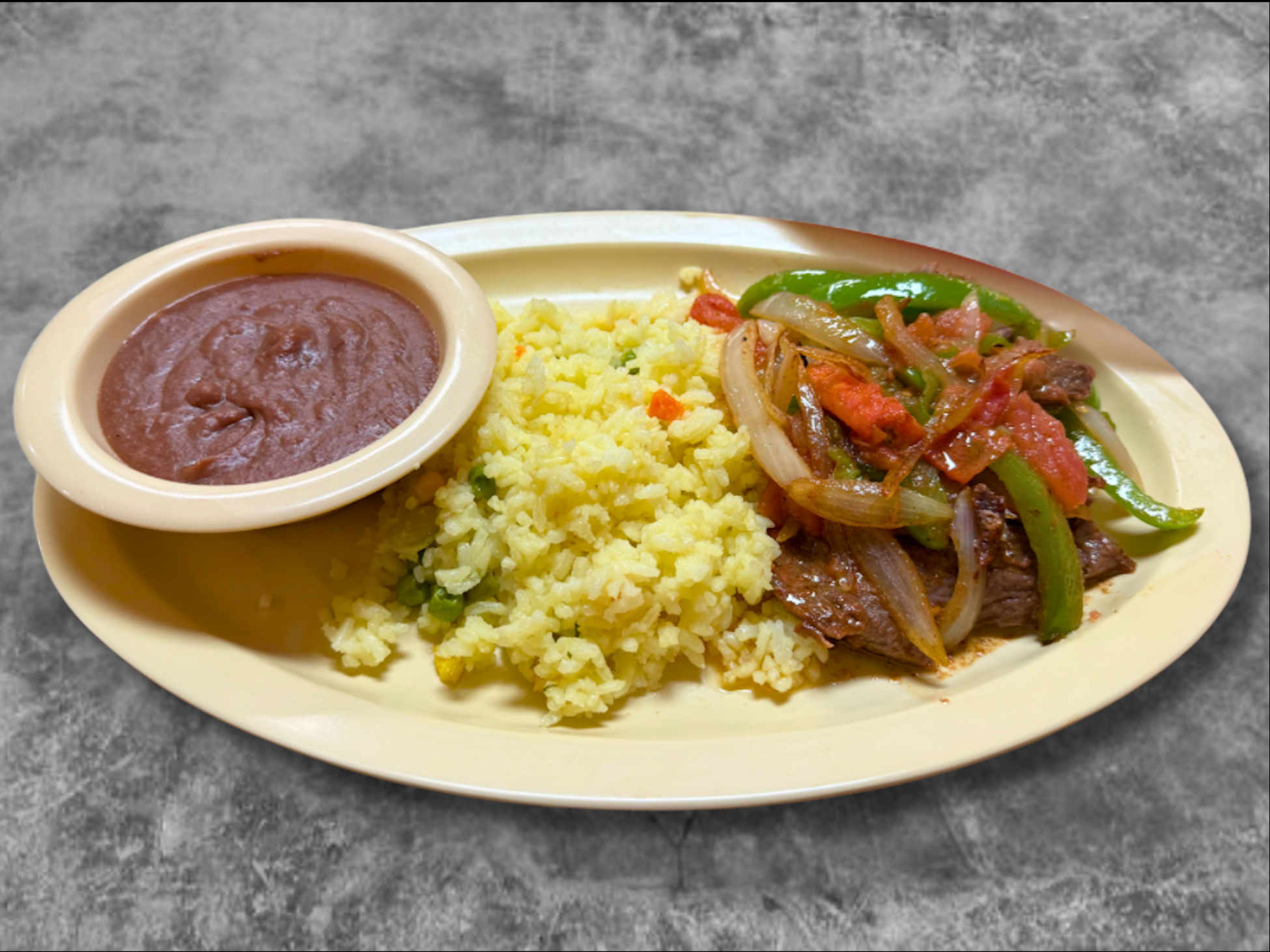 Bistec Encebollado