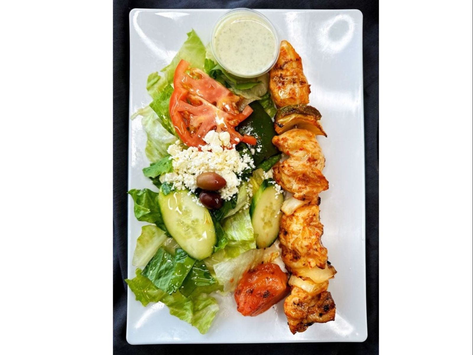 Tandoori Chicken (1 Skewer)  Over Salad.