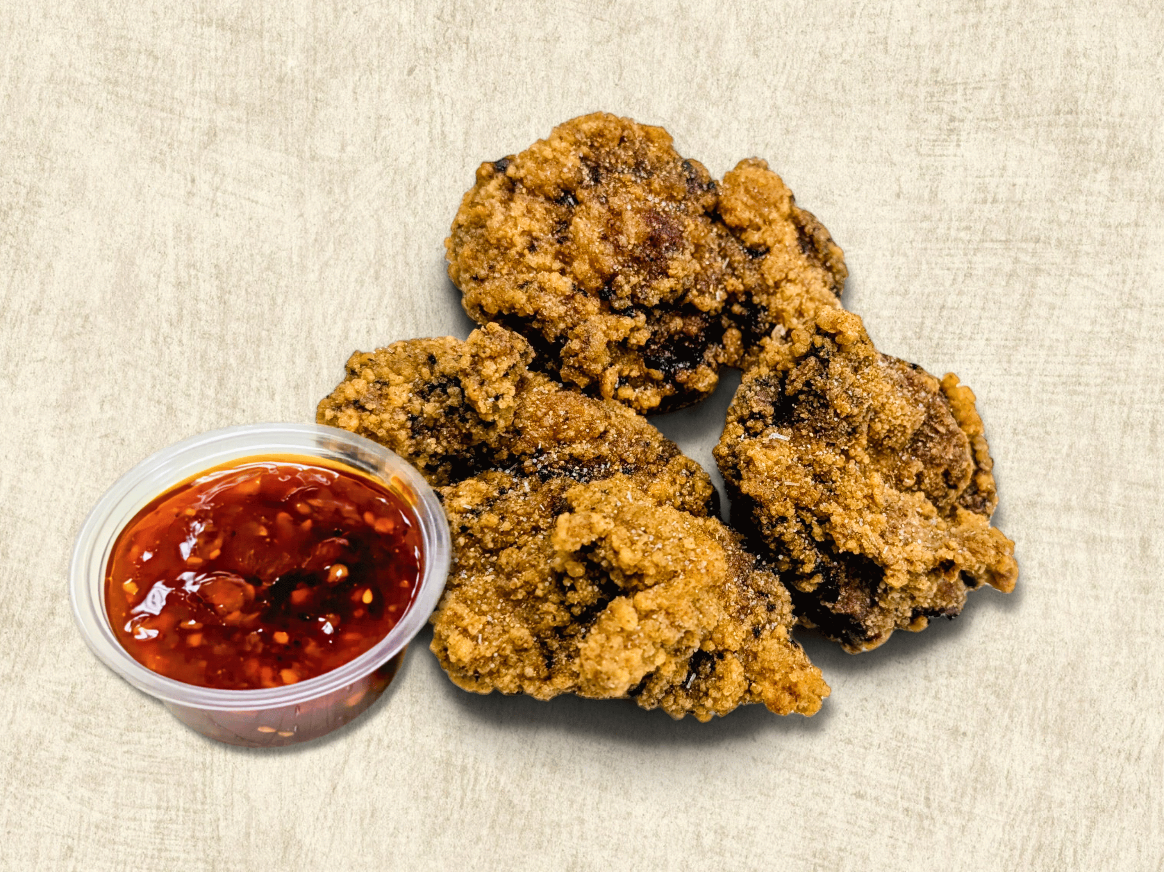 Hand-Breaded Chicken Crisps.