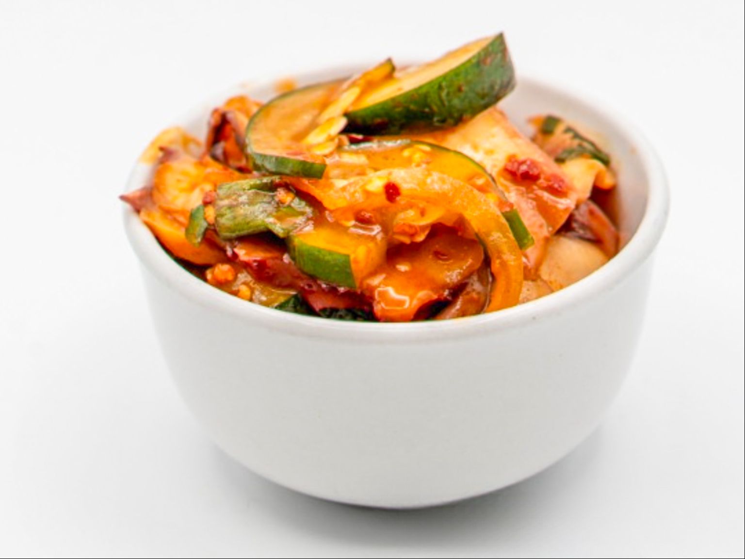 Korean Style Tako Poke from Yama's Fish Market — Thinly cut tako, sliced round onions and green onions with our Korean style sauce. Click for available sizes/pricing