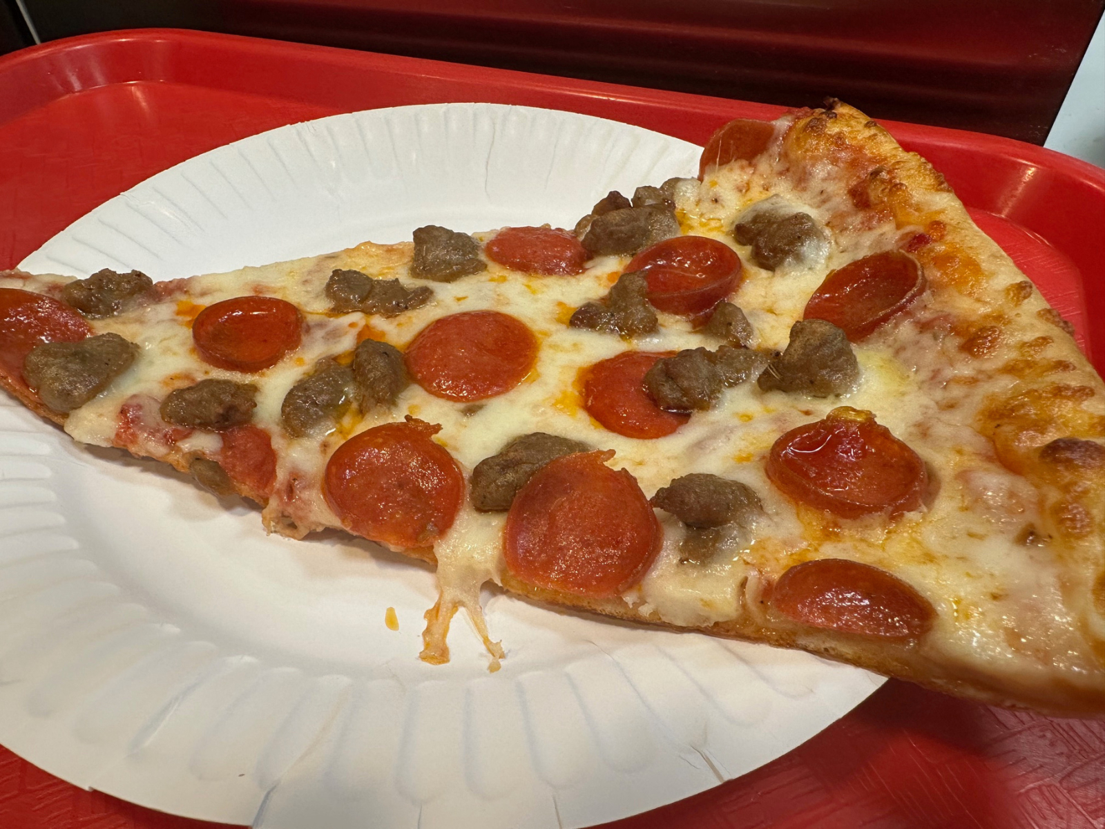 Pizza Slice: Pepperoni Sausage.