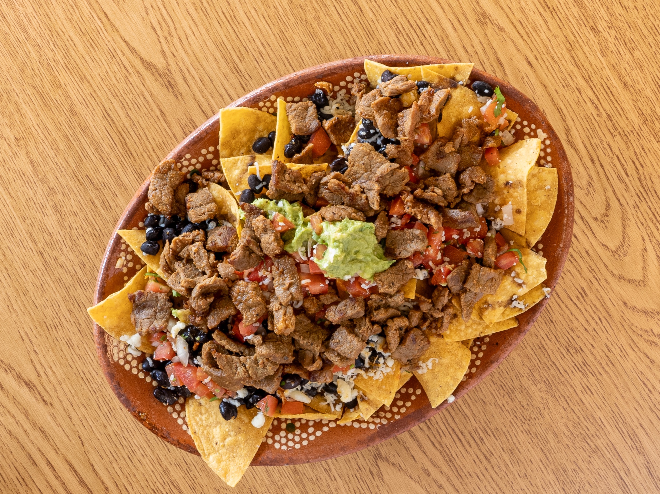 Surf & Turf (Mar y Tierra) Nachos.
