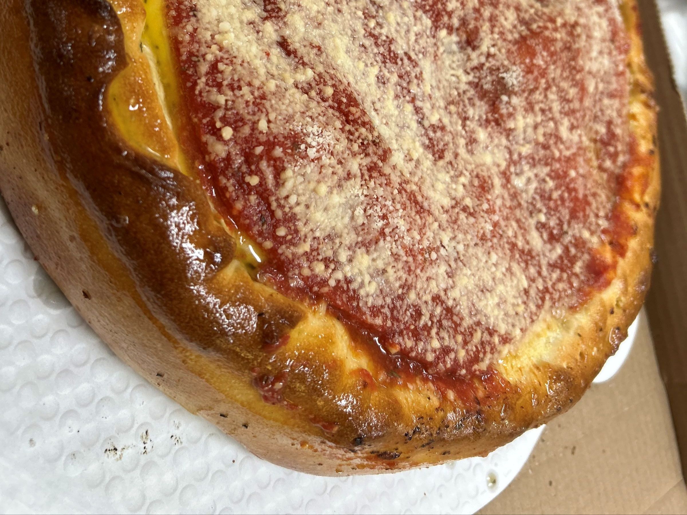 Stuffed Deep Dish (Sauce on the top).