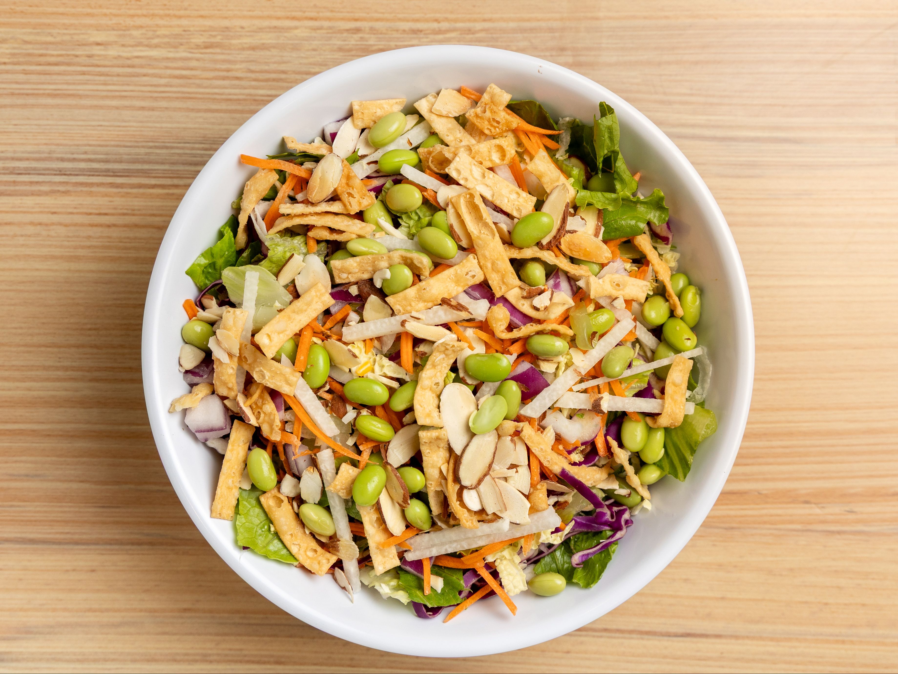 Asian Crunch - Asian blend, carrots, red onions, jicama, edamame, wonton strips, toasted almonds, Asian dressing