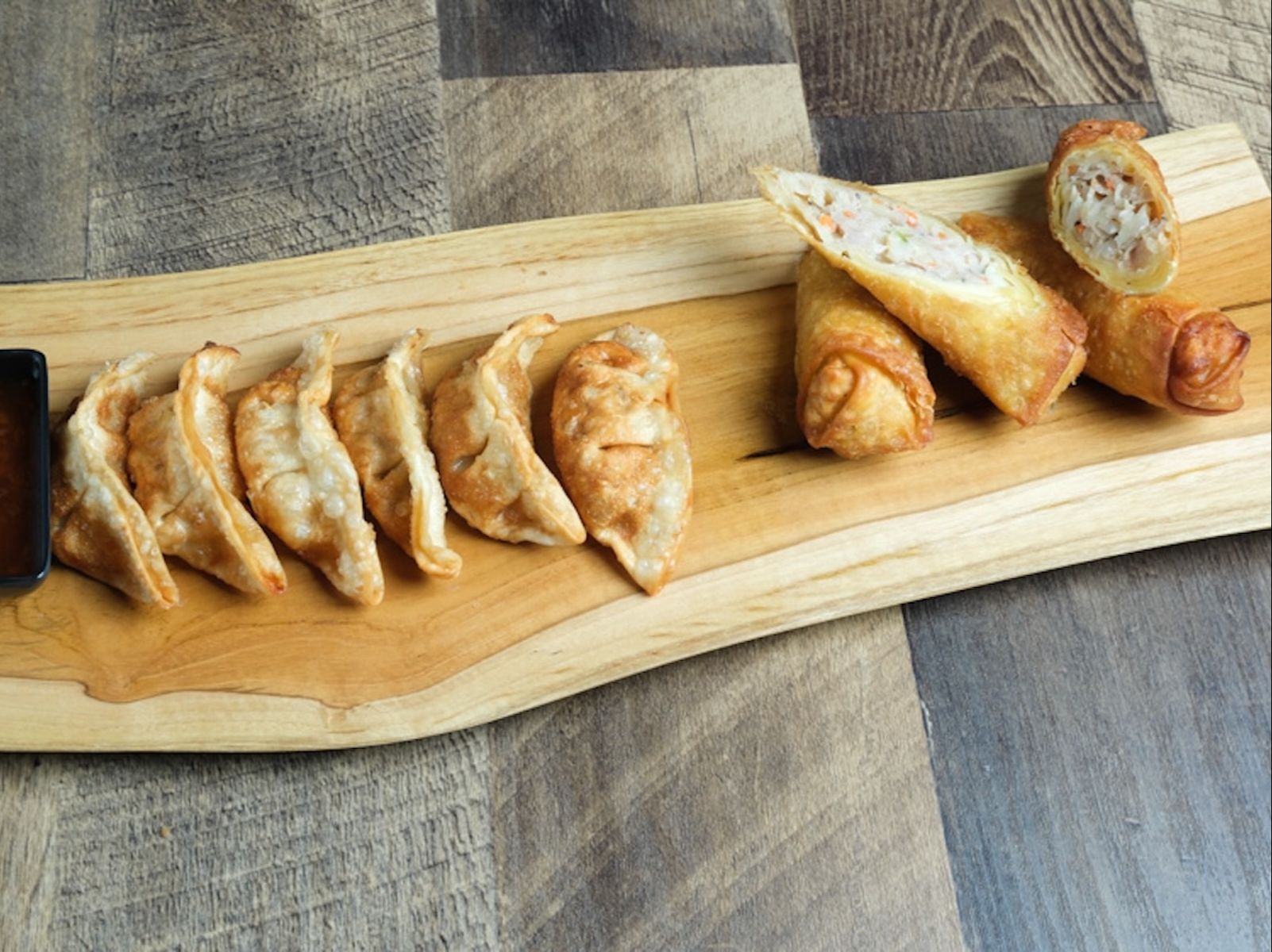 A4- Pot Stickers (6) & Egg Roll (2).