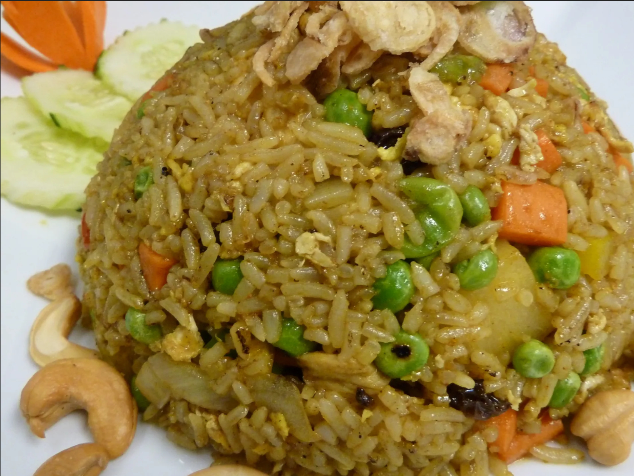 Curry Pineapple Fried Rice (L).