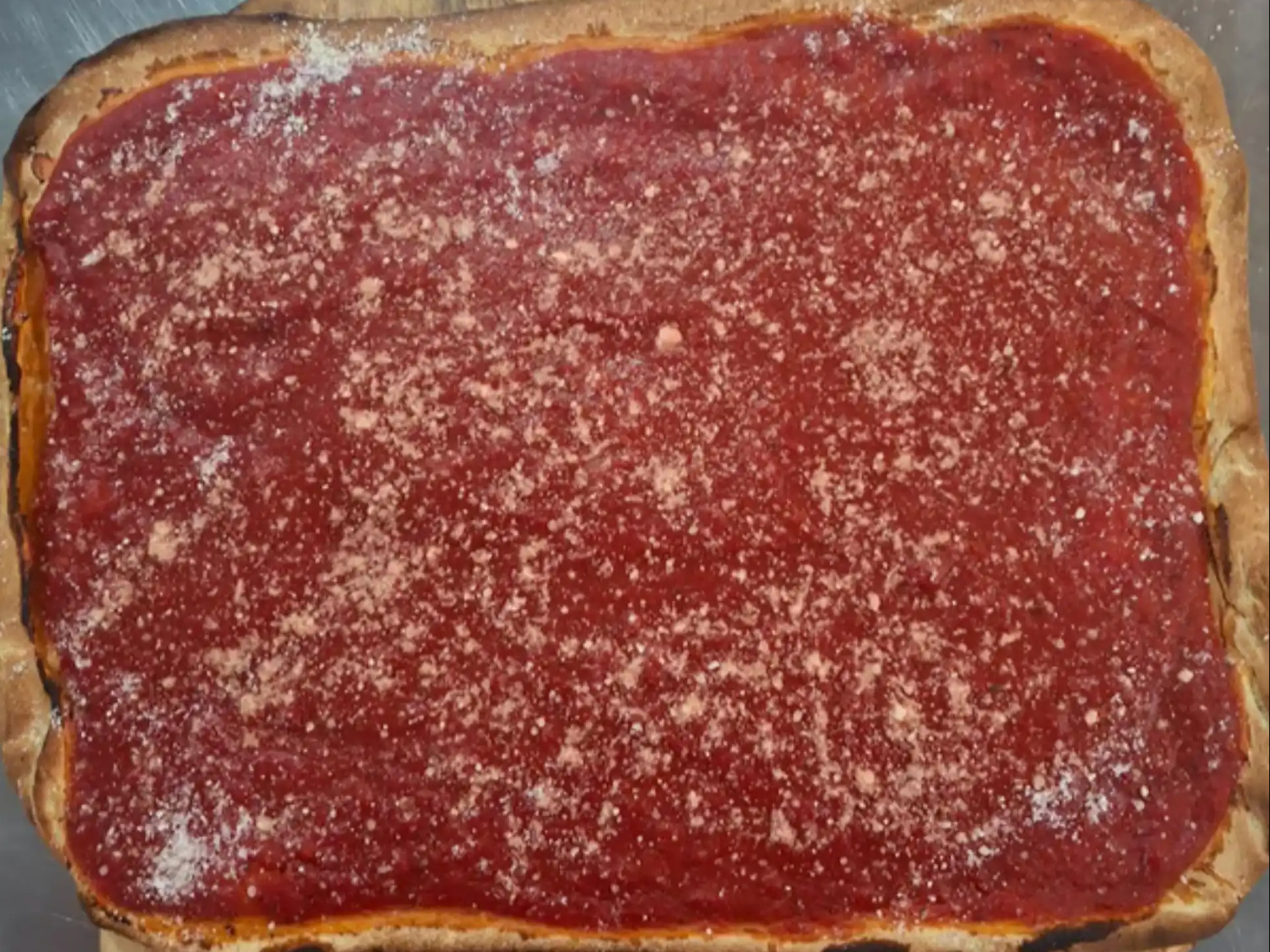 Tomato Pie - w/ pecorino on top.