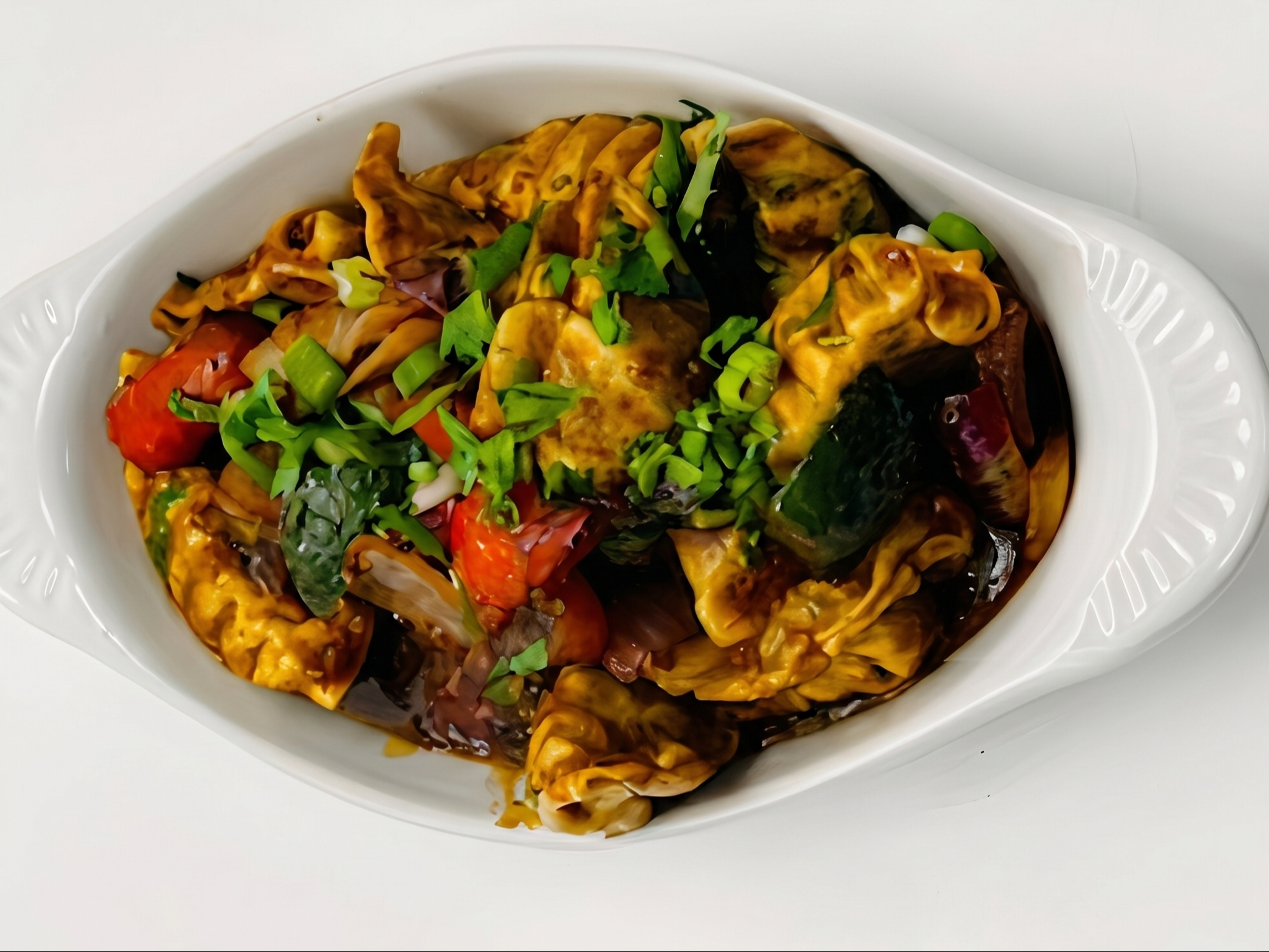 Manchurian Veg Momos.