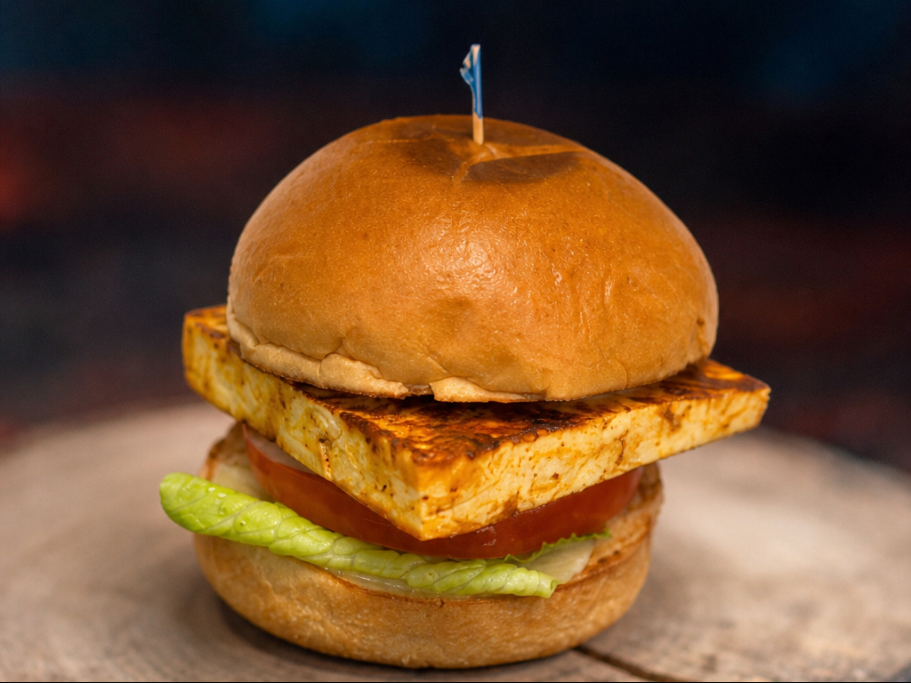 Grilled Paneer Burger (V) (Grilled Paneer Cheese, Lettuce, Tomato, Onion, Pickle, Sharjah Sauce).