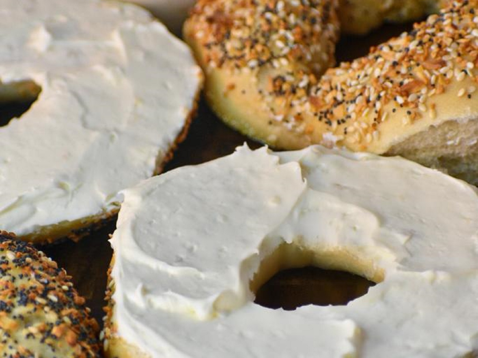 BAGEL W/ CREAM CHEESE & BUTTER (both sides).
